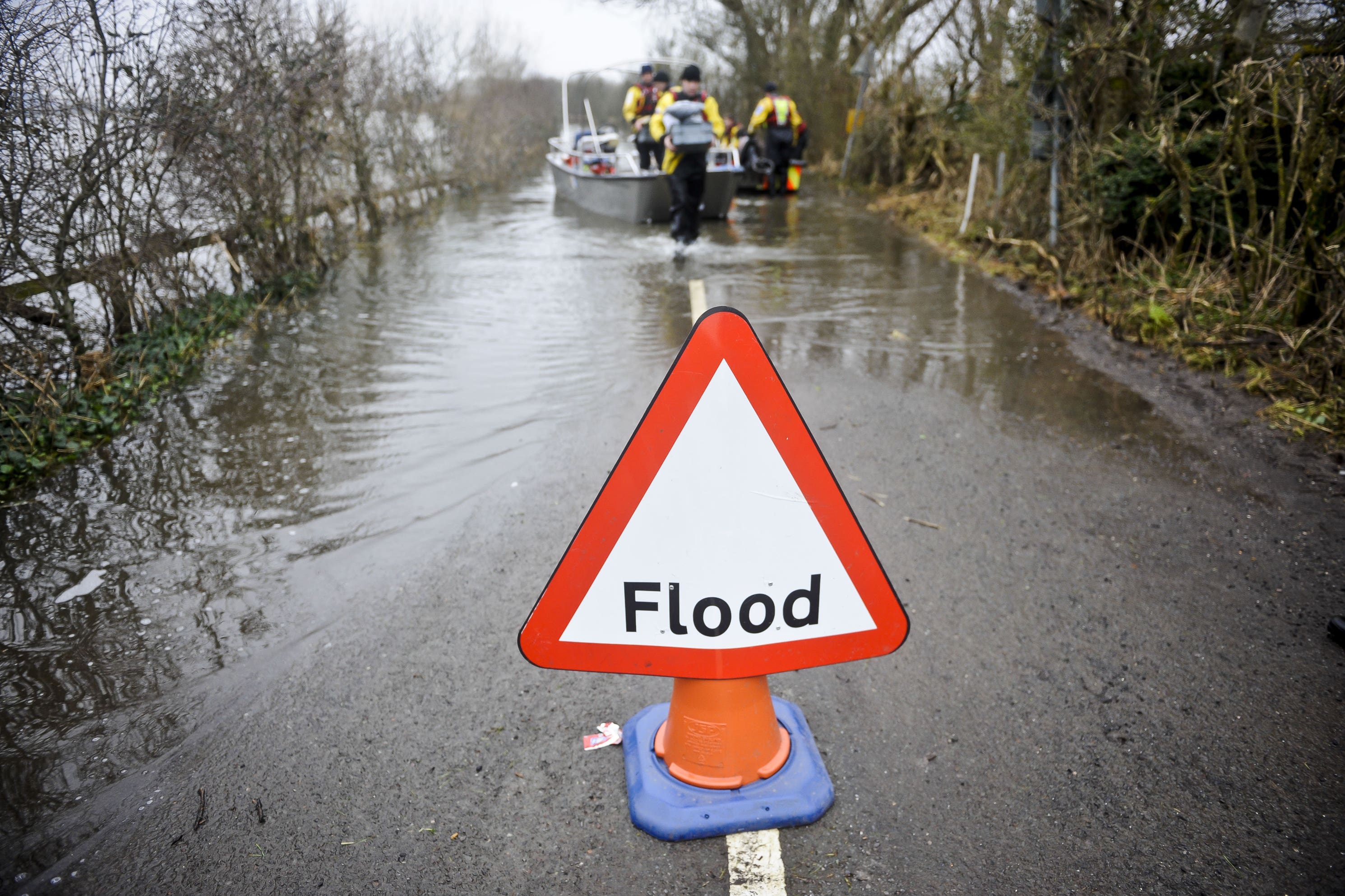 A flood warning sign (Ben Birchall/PA)