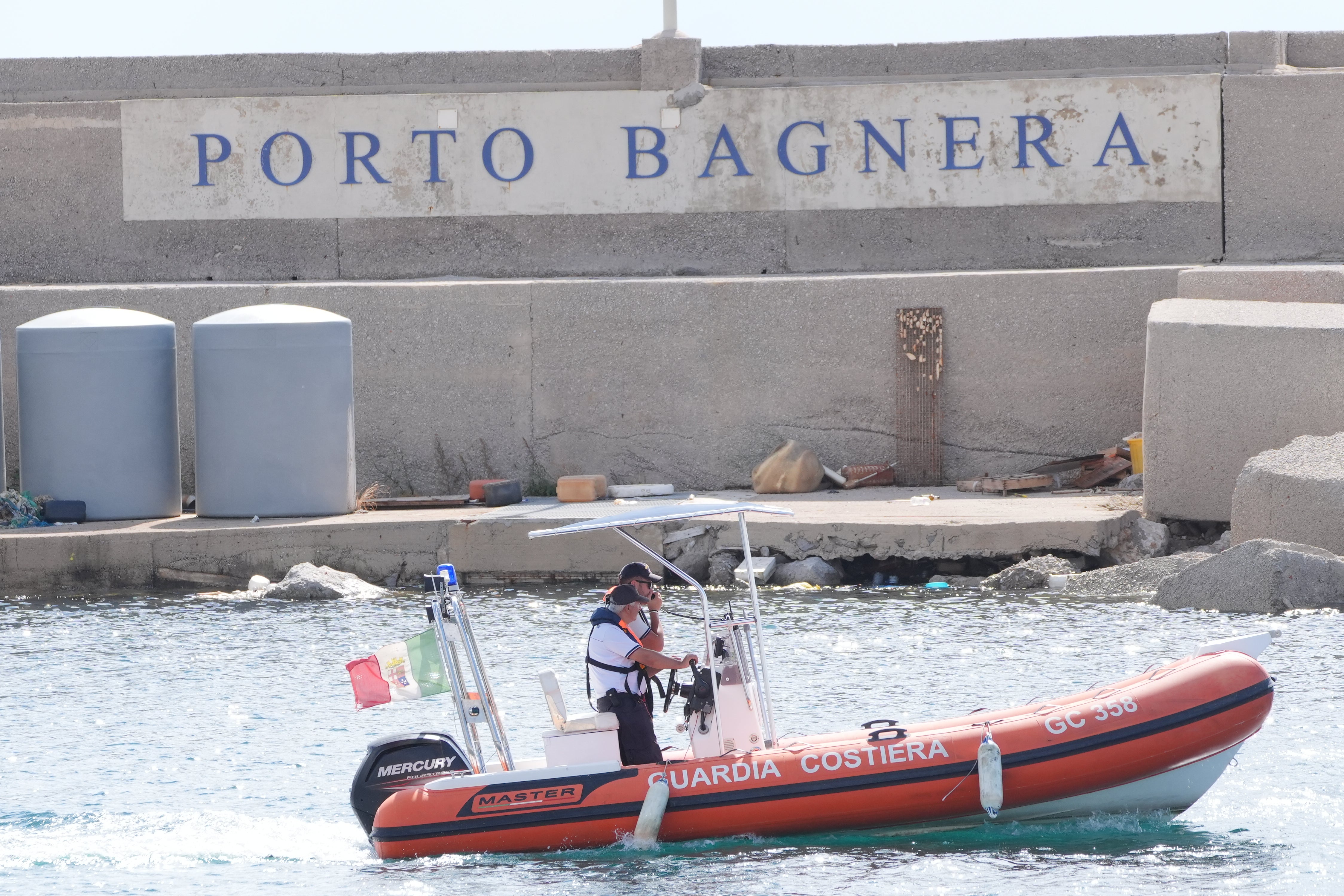 Italian emergency services during the search for the sunken yacht Bayesian (Jonathan Brady/PA)