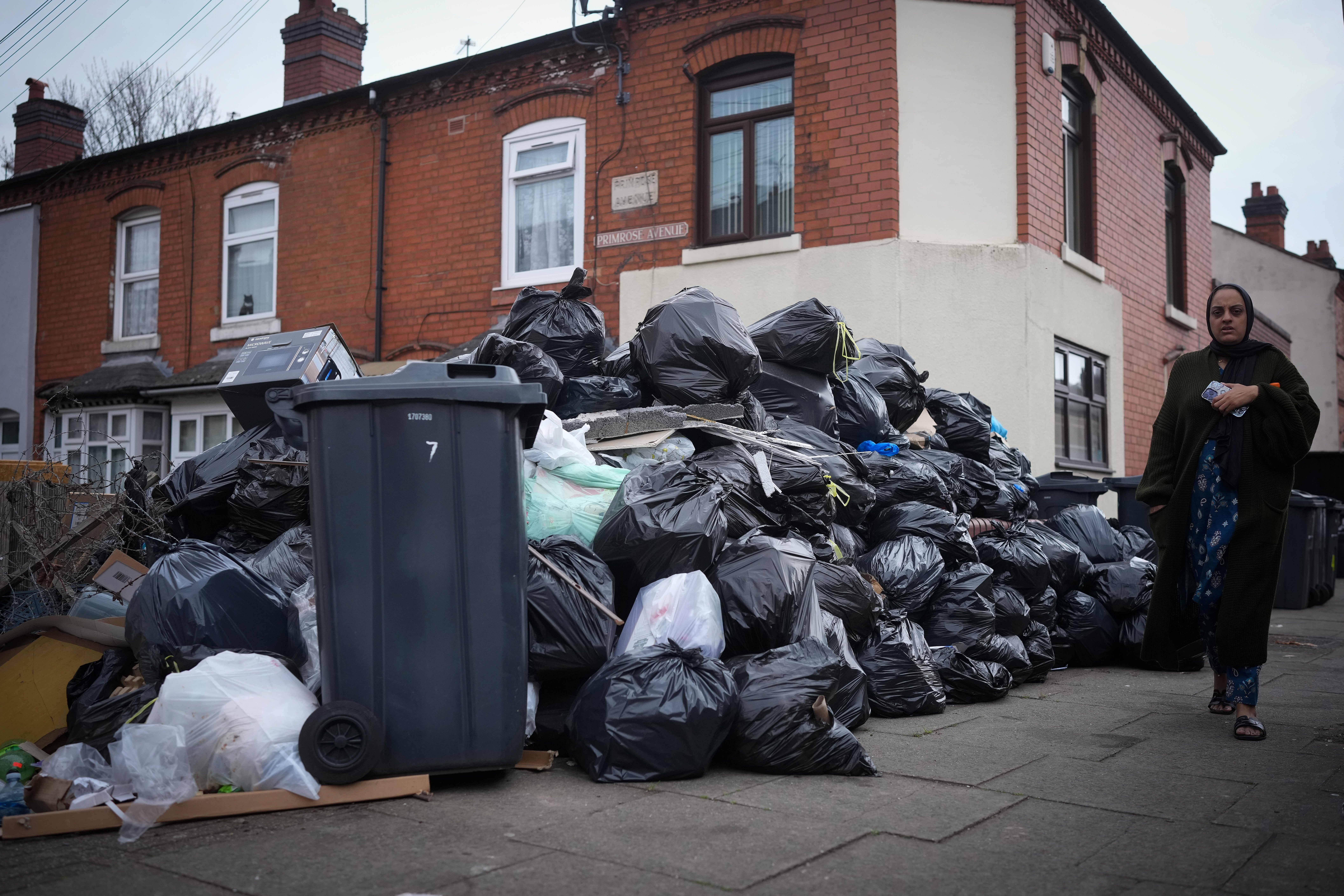 Uncollected household waste in Sparkbrook, Birmingham, as council refuse collectors continue their strike on 15 April 2025
