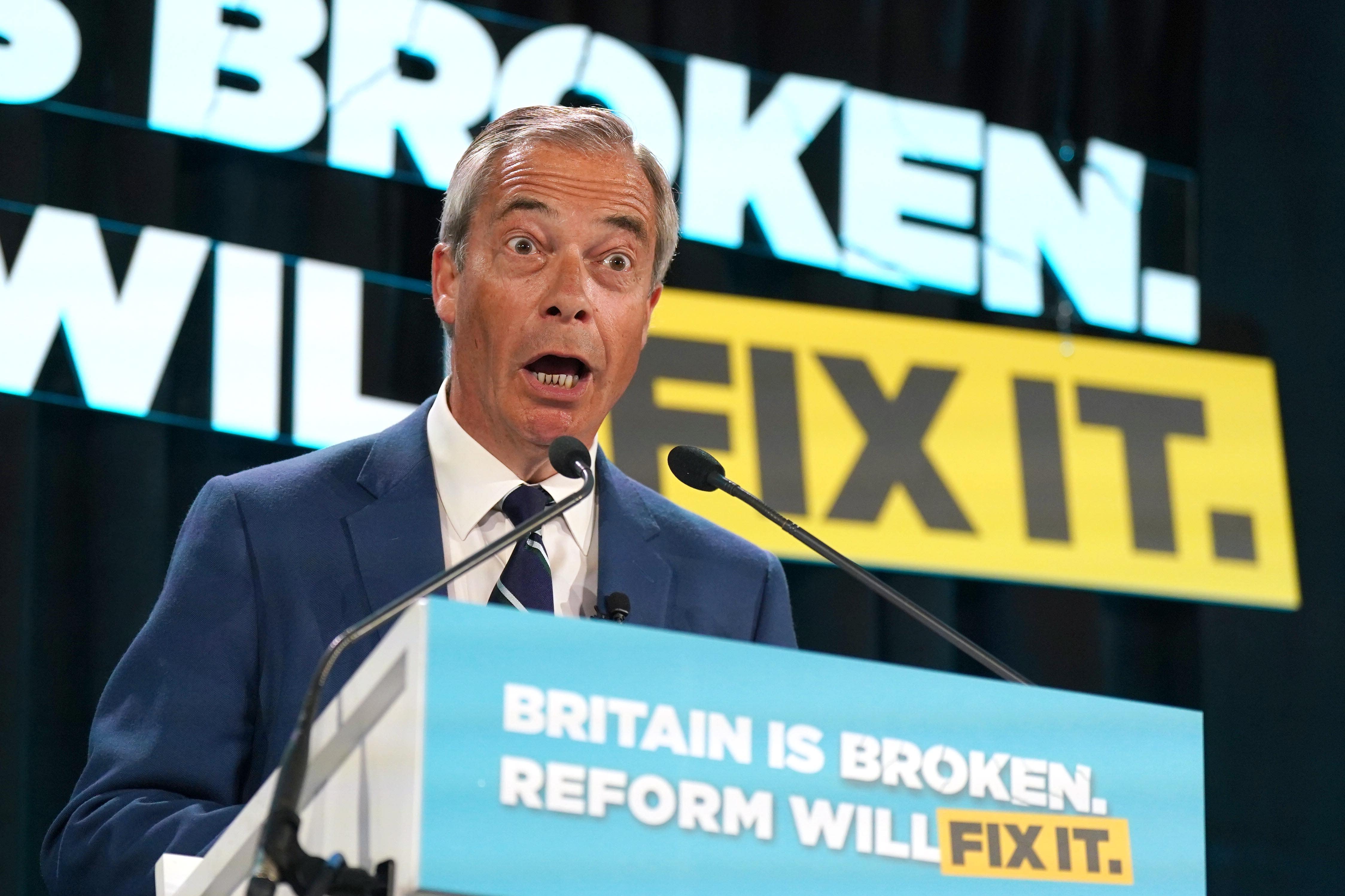 Reform UK leader Nigel Farage speaking at the Newton Aycliffe working men’s club in Durham while on the local election campaign trail (Owen Humphreys/PA)