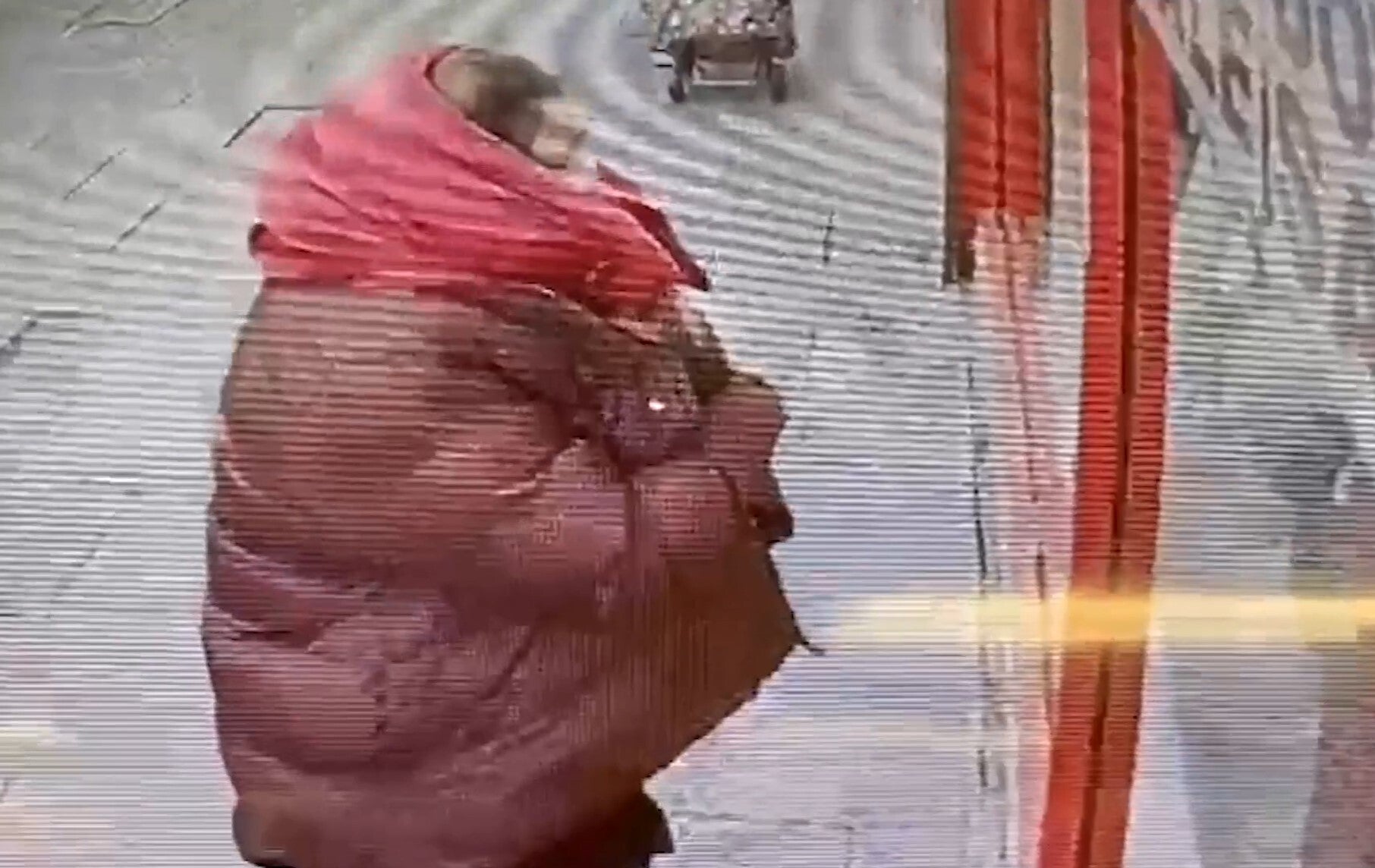 CCTV footage showed Ms Marten holding the baby inside her jacket in East Ham, London, while on the run