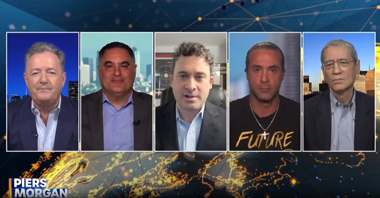 Piers Morgan grills Washington Post columnist Josh Rogin on his recent criticism of Bill Maher's dinner with Donald Trump, wondering why he won't do the same with his boss Jeff Bezos.