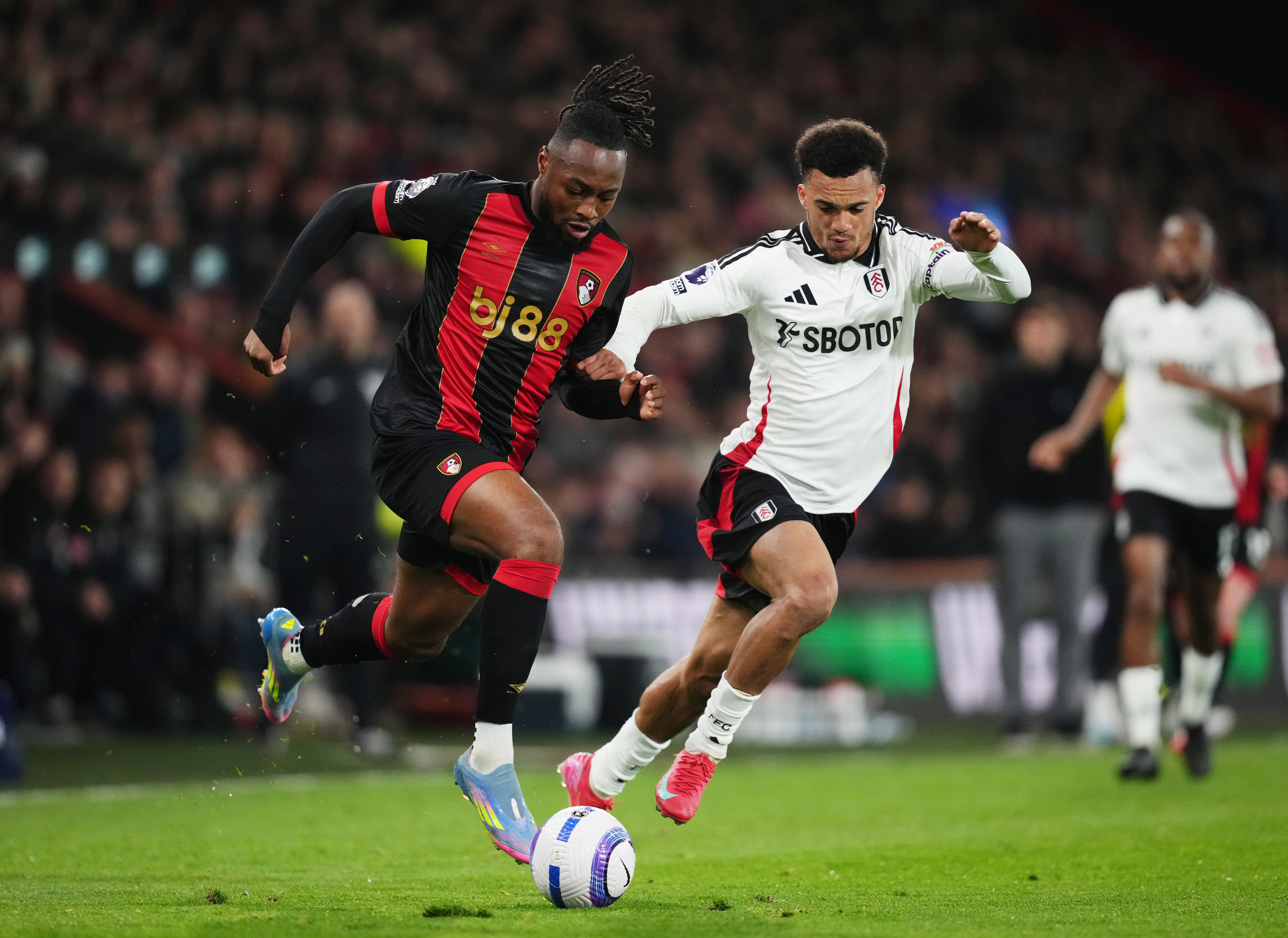 Antonee Robinson's (right) error allowed Semenyo to nip in and score