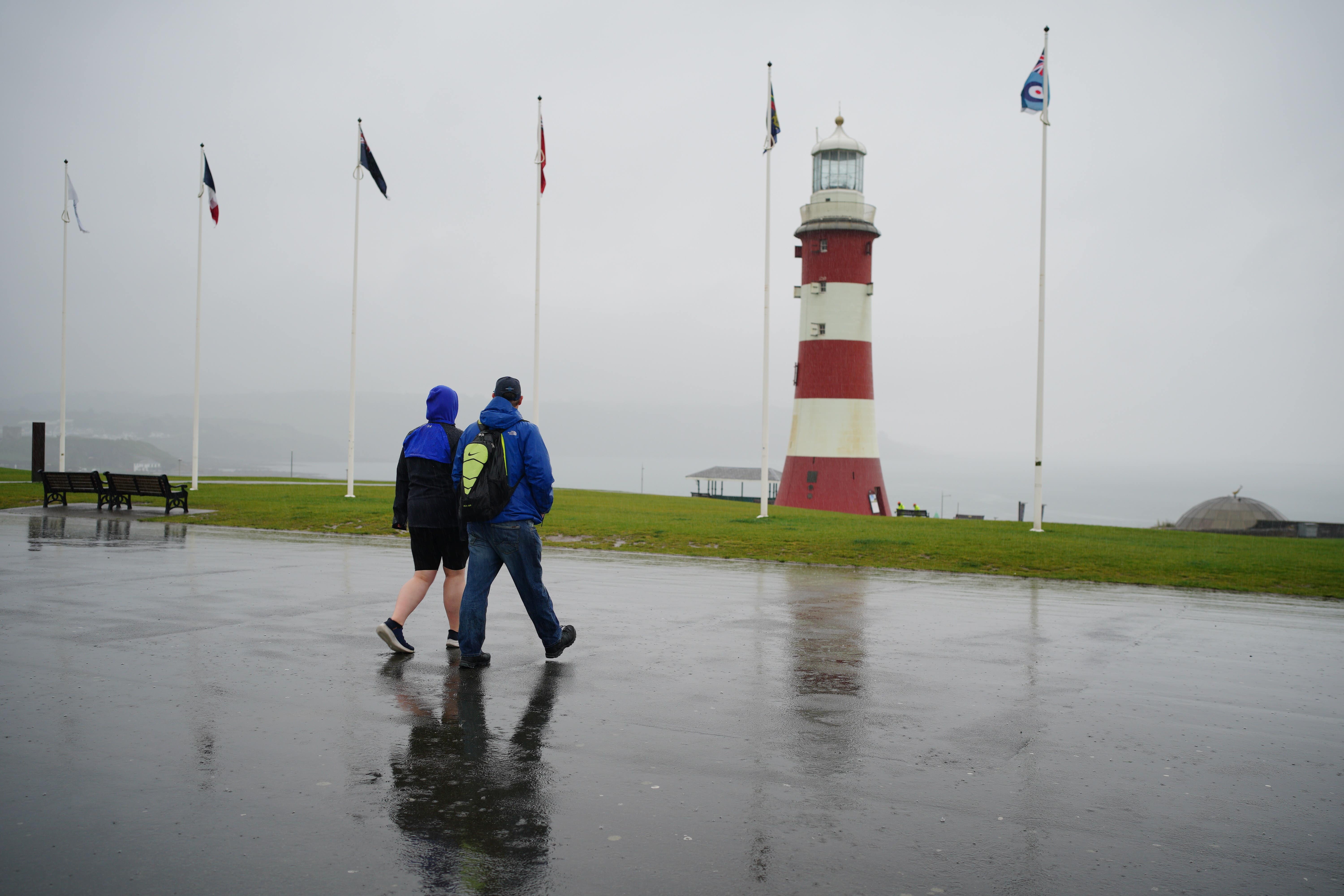 Rain and wind is predicted for this weekend alongside sunny spells (Ben Birchall/PA)