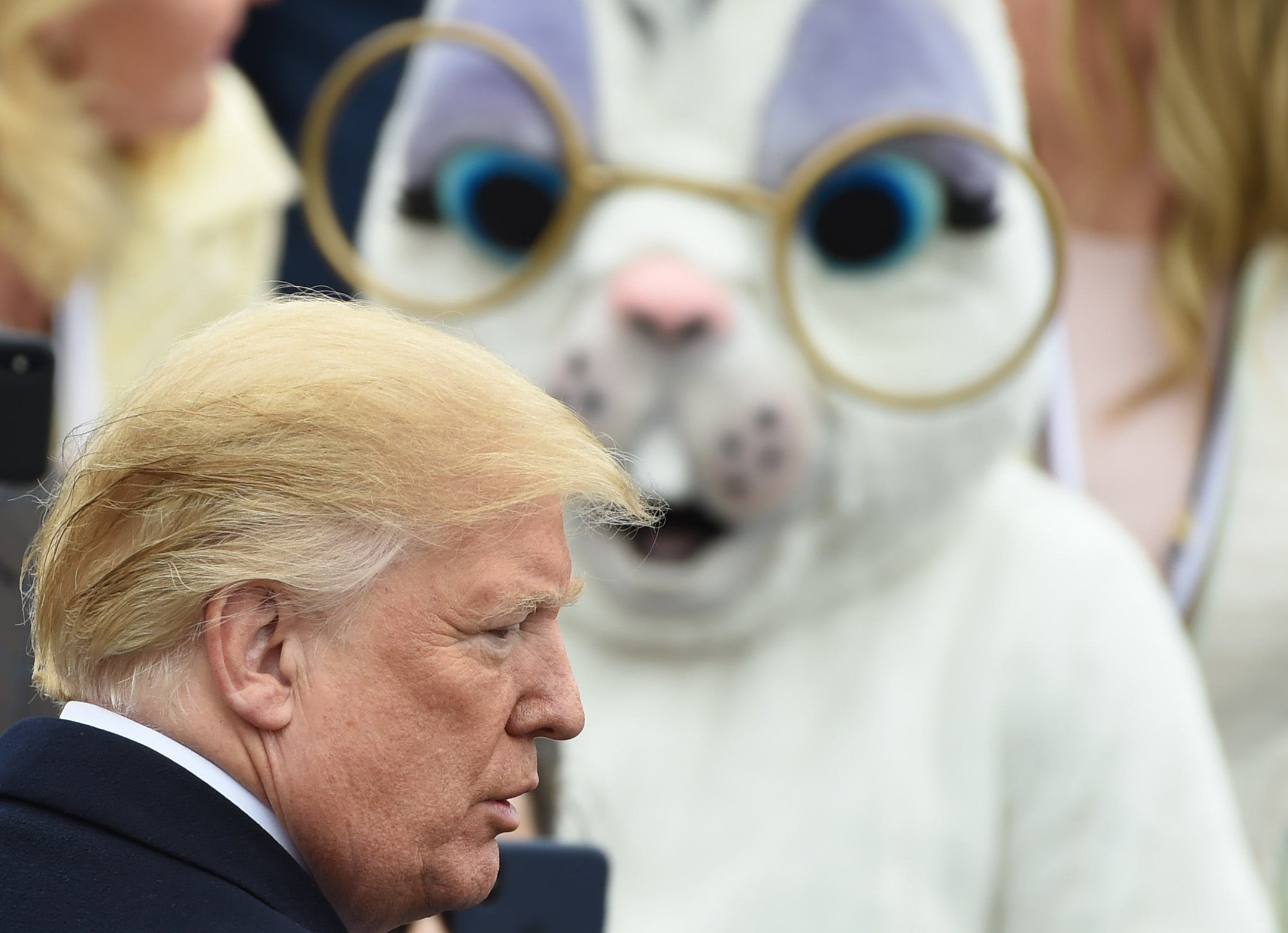 President Donald Trump looks on near the Easter Bunny during Easter celebrations in 2018