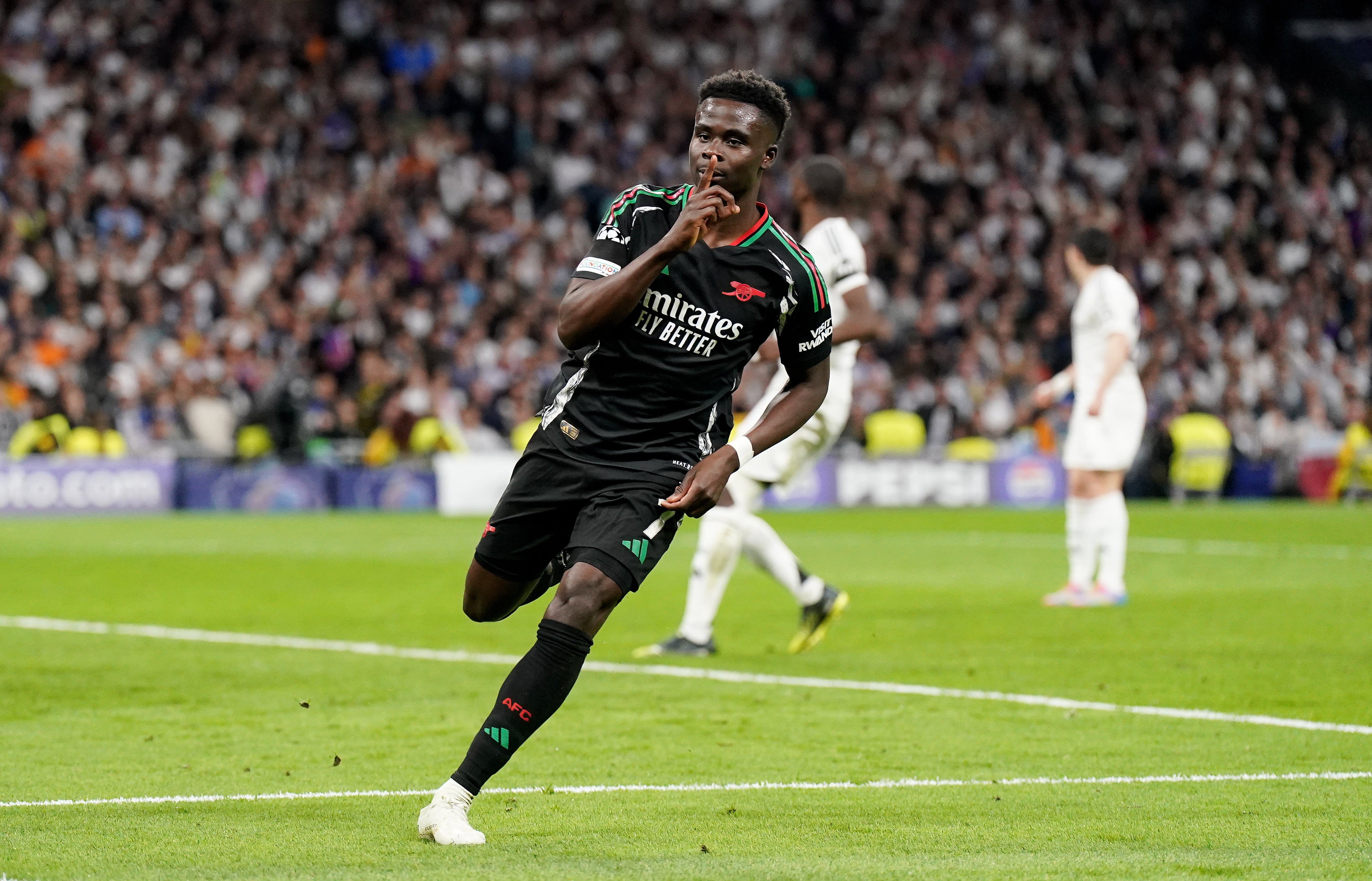 Bukayo Saka quietened the Bernabeu (Adam Davy/PA)