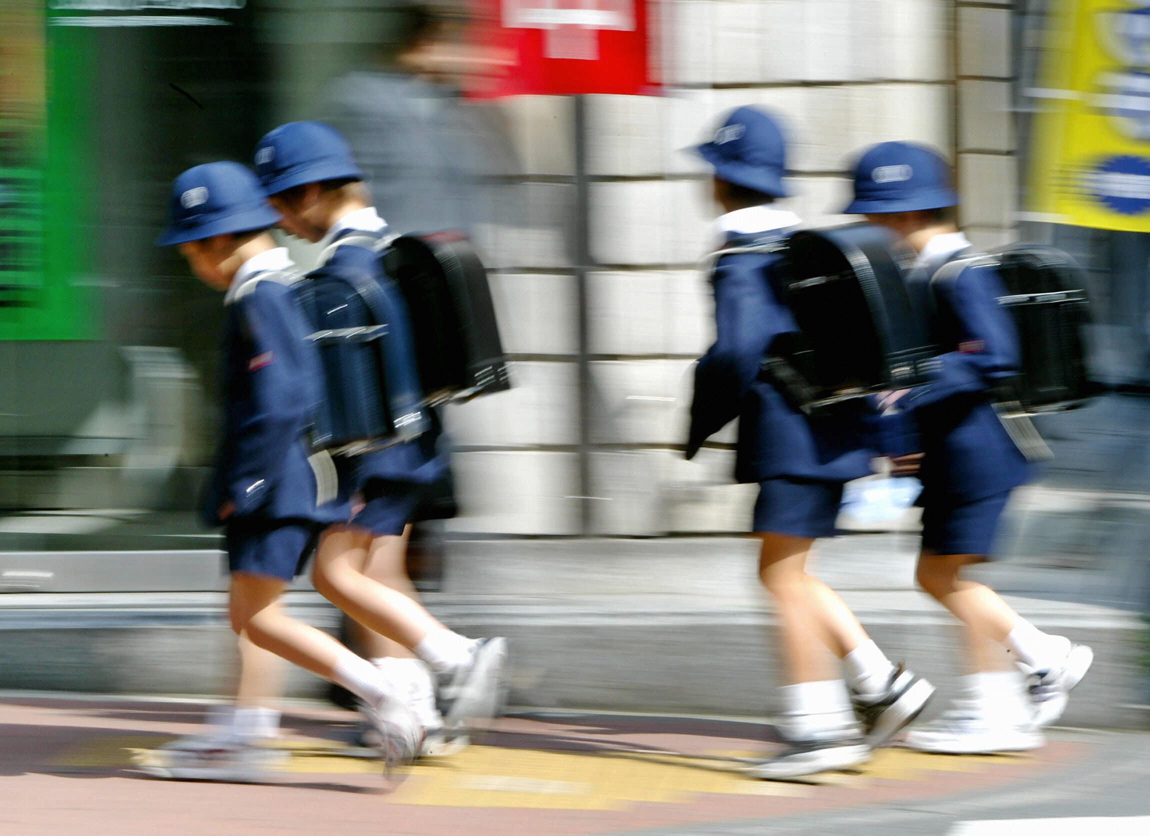 Representative. School children making their way to class in Tokyo