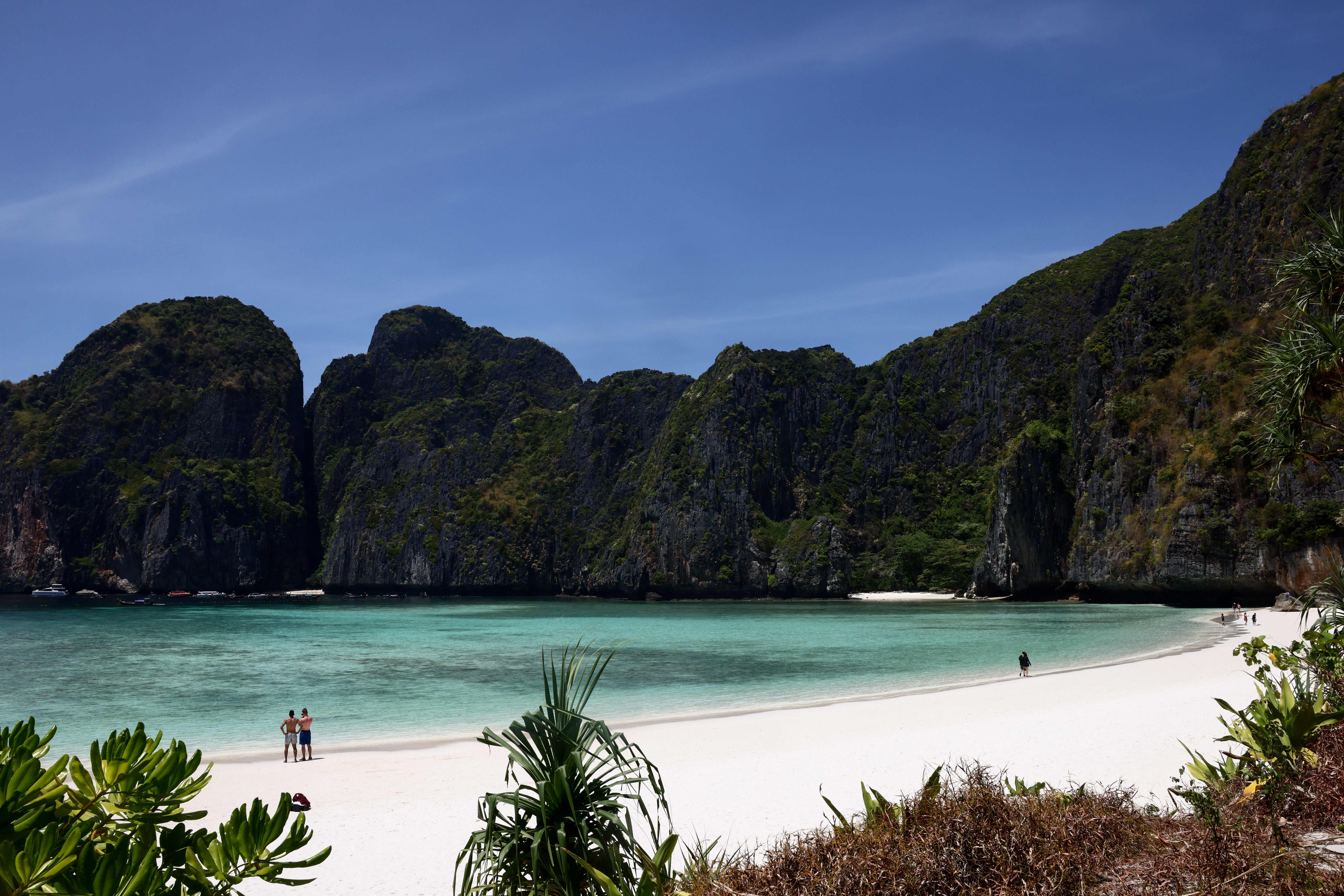 Tourists visit Maya Bay on Thailand's Phi Phi Leh island