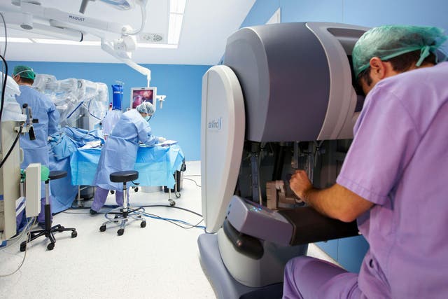 <p>State-of-the-art robotic systems that can help remove tumours or replace a patient’s knee have been approved for use on the NHS in England</p>