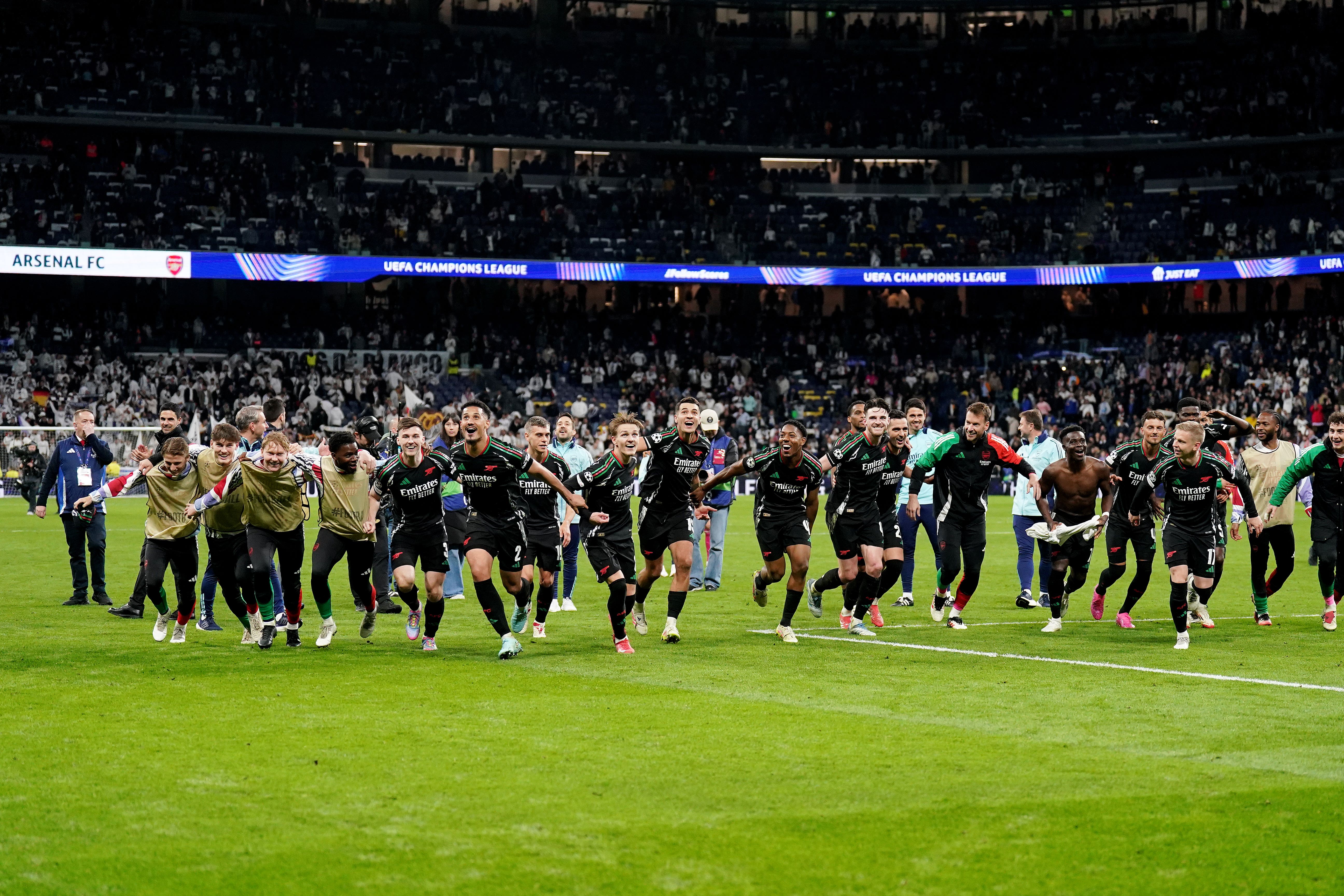 Arsenal players celebrate after the UEFA Champions League quarter-final, second leg match at the Santiago Bernabeu in Madrid, Spain. Picture date: Wednesday April 16, 2025.