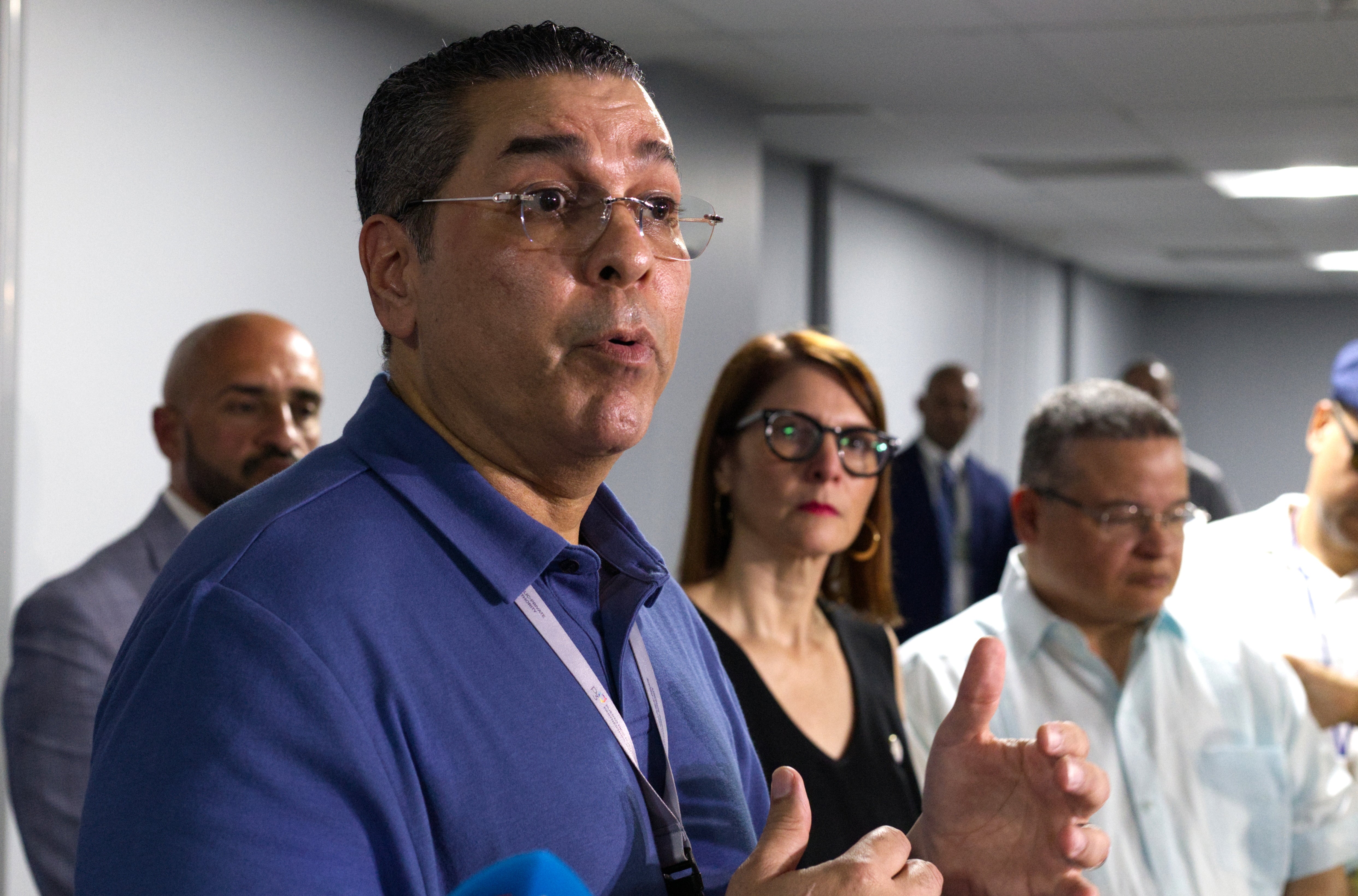 Puerto Rico's Energy Czar Josué Colón speaks alongside Interim Governor and Secretary of State Veronica Ferraiuoli during a press conference in San Juan, Puerto Rico as the territory suffers an island-wide blackout