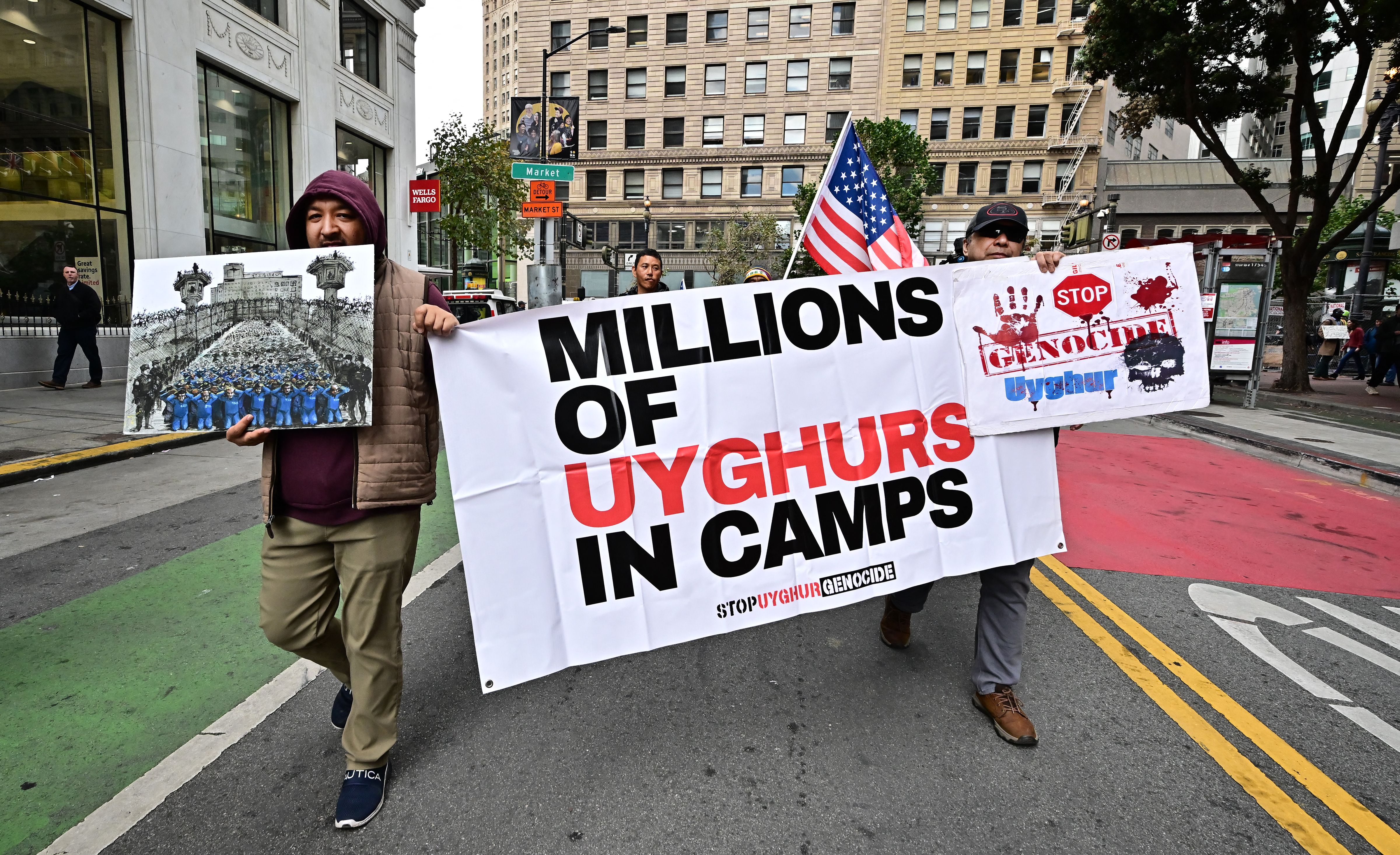 Demonstrators representing Tibetans and Uyghurs protest during the Asia-Pacific Economic Cooperation (APEC) Leaders' Week in San Francisco, California