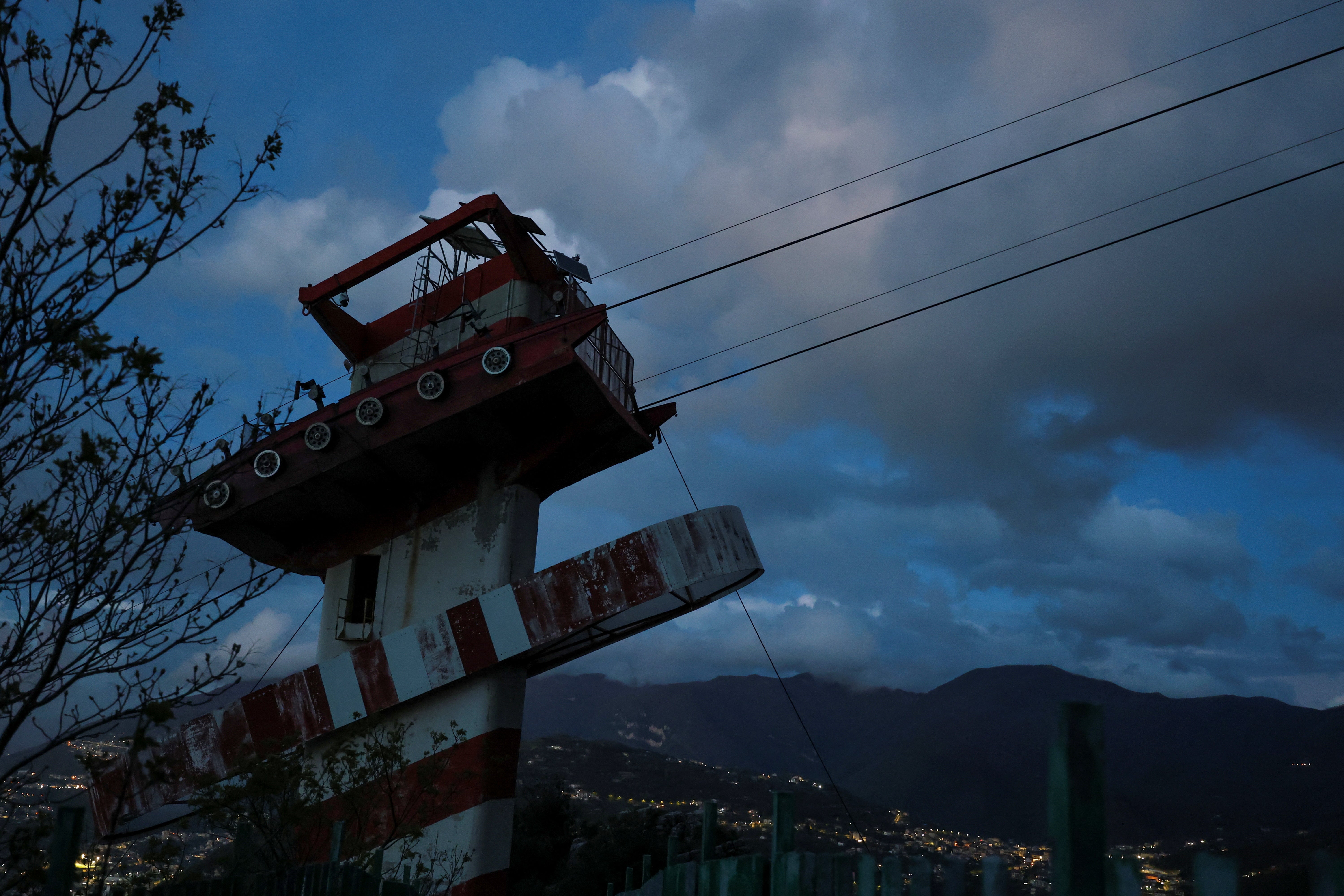 A cable car pylon is seen at the site of the crash that killed four people in Monte Faito, near Naples, on Thursday