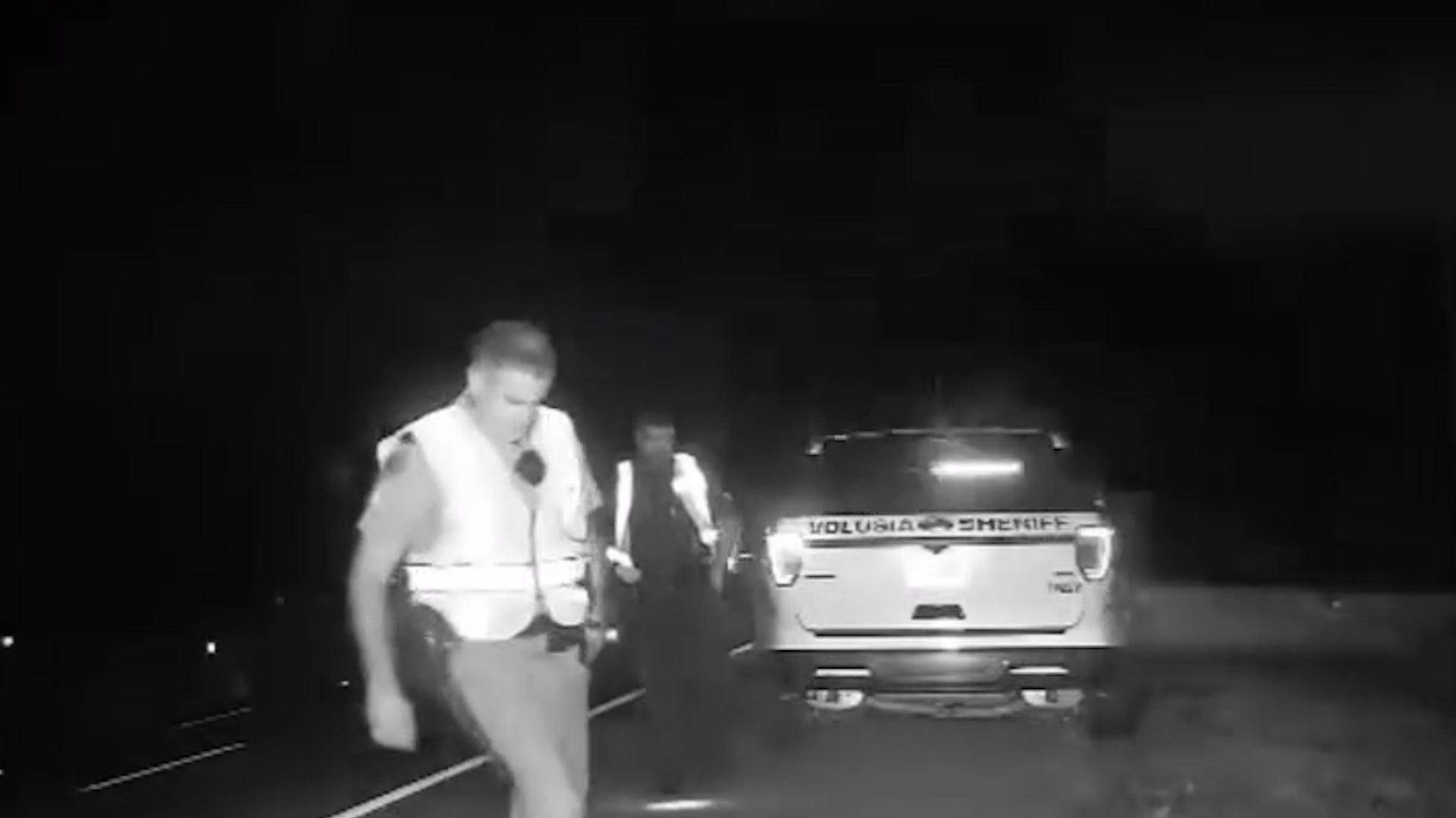 Heart-stopping moment out-of-control SUV almost crushes two highway patrol troopers