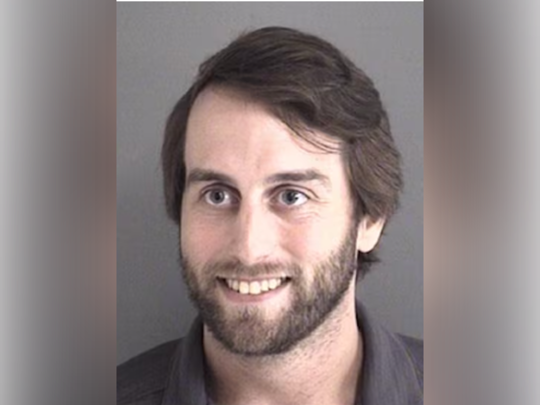 Tanner Bandy was arrested for stalking and threatening to commit a mass shooting at the Iowa State University commencement ceremony next month, authorities announced