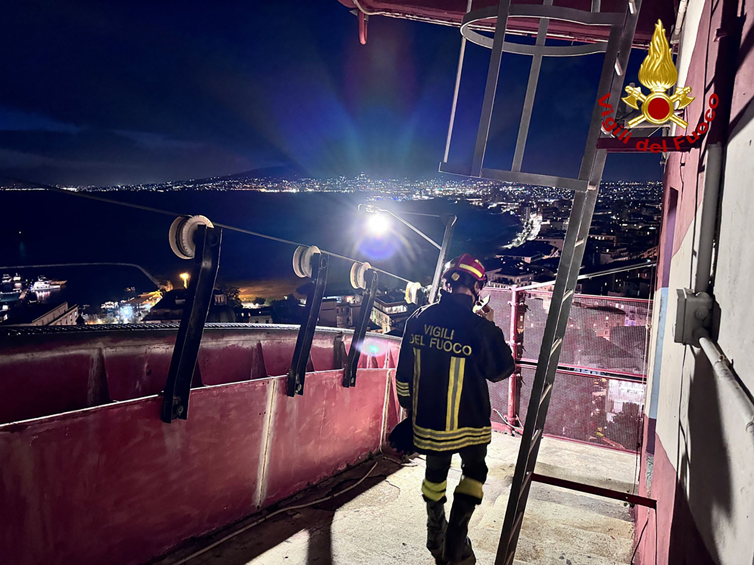 Firefighters working on the site of the Monte Faito cable car collapse on Friday