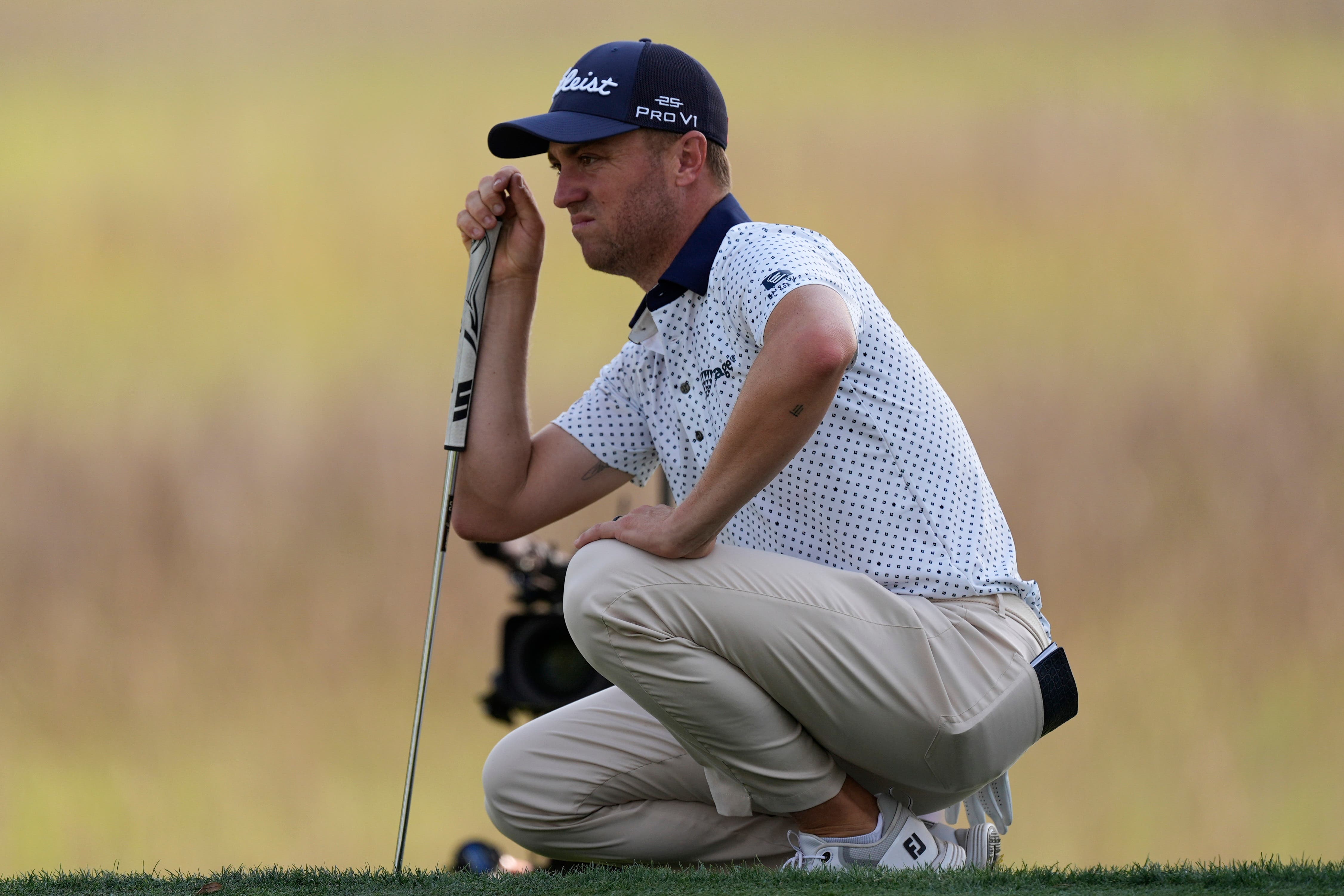 Justin Thomas lines up a putt on the 17th green during the second round of the RBC Heritage golf tournament (Mike Stewart/AP)