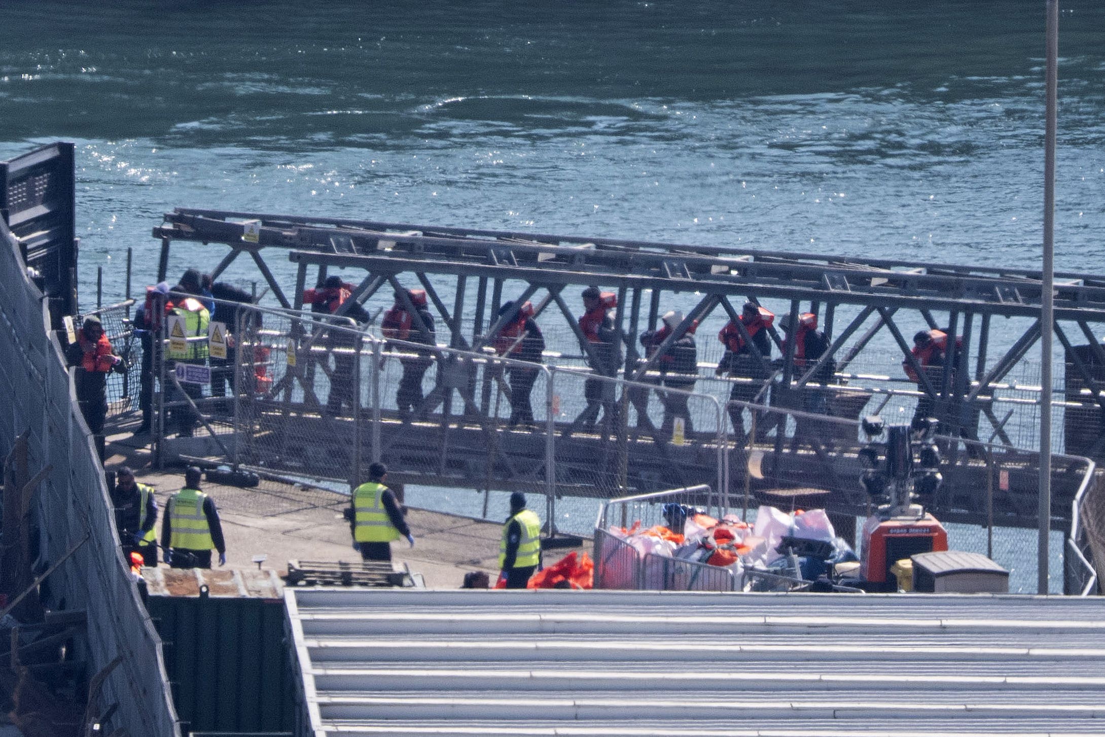A group of people thought to be migrants are brought in to Dover, Kent, from a Border Force vessel (Gareth Fuller/PA)