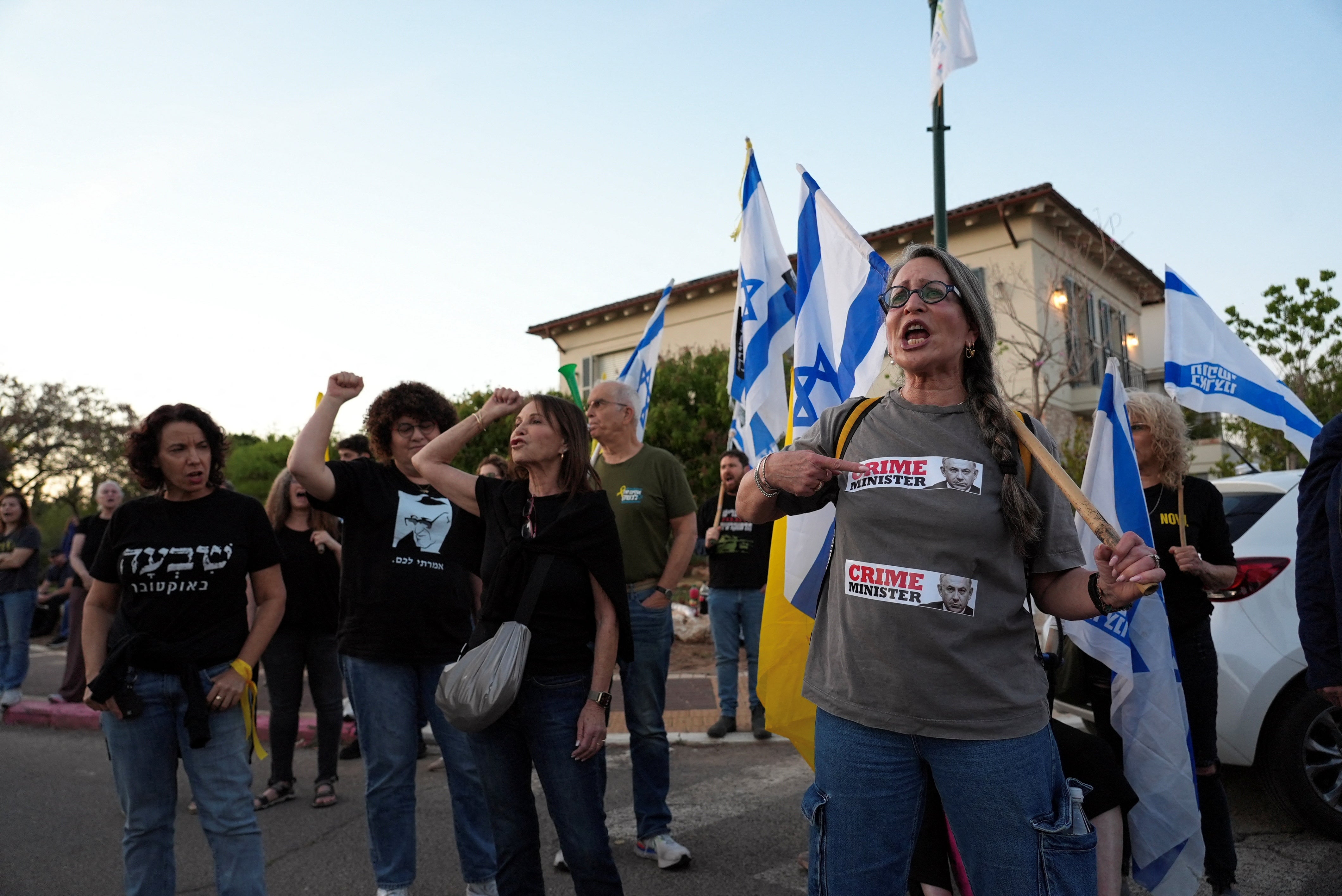 People take part in a protest in support of the release of all hostages kidnapped, in Mazor, Israel