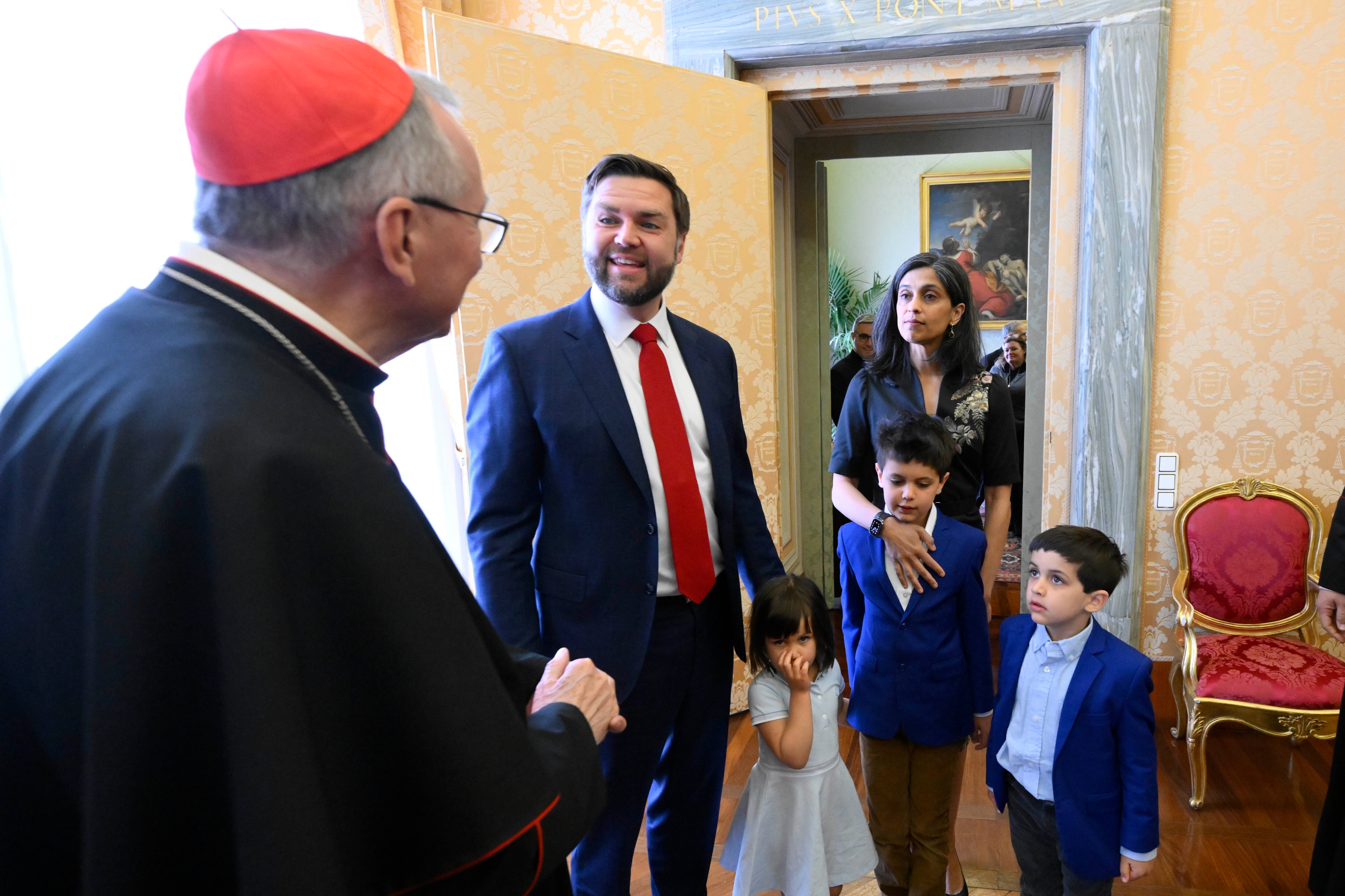 From left, Vatican Secretary of State Cardinal Pietro Parolin meets with U.S. Vice President JD Vance, his daughter Mirabel, his wife Usha, and their sons Ewan and Vivek