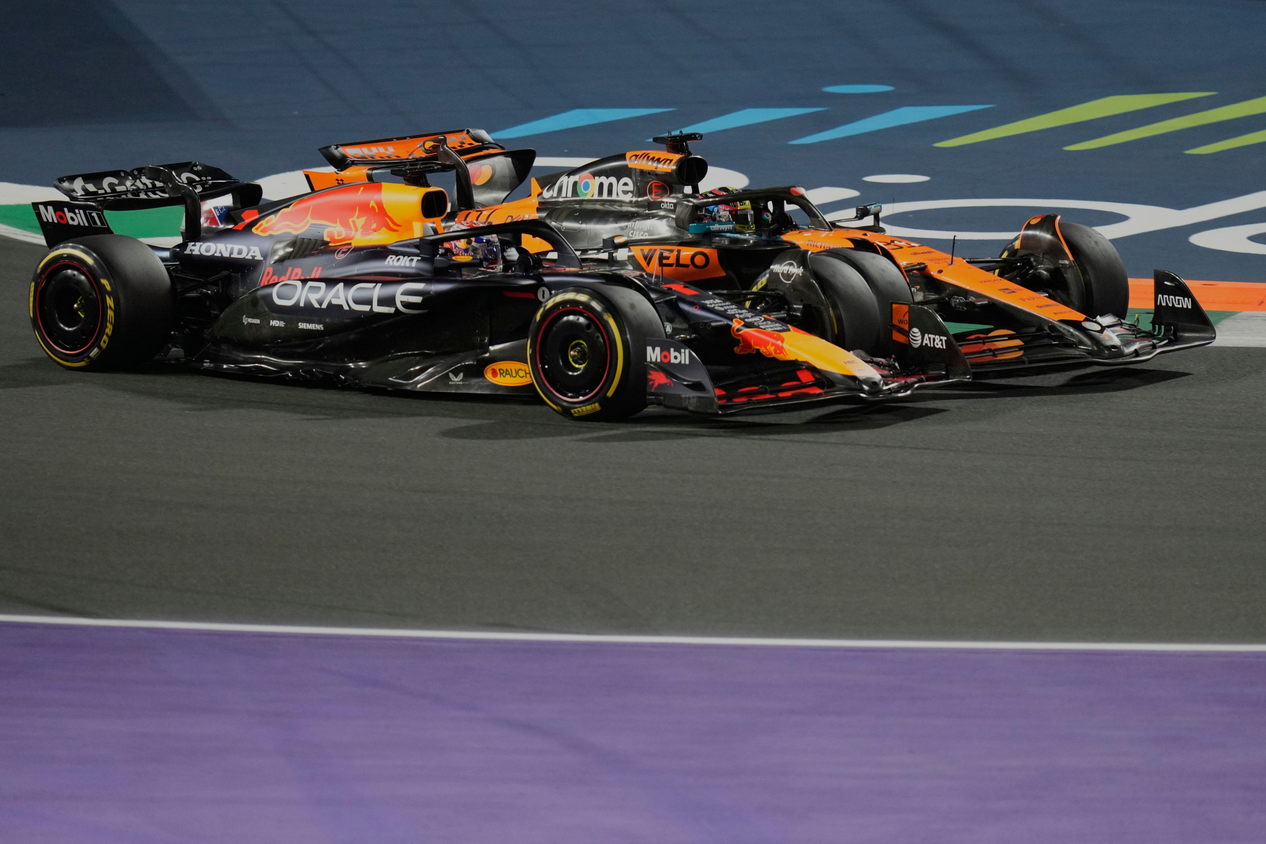 Oscar Piastri and Max Verstappen went into turn one side-by-side