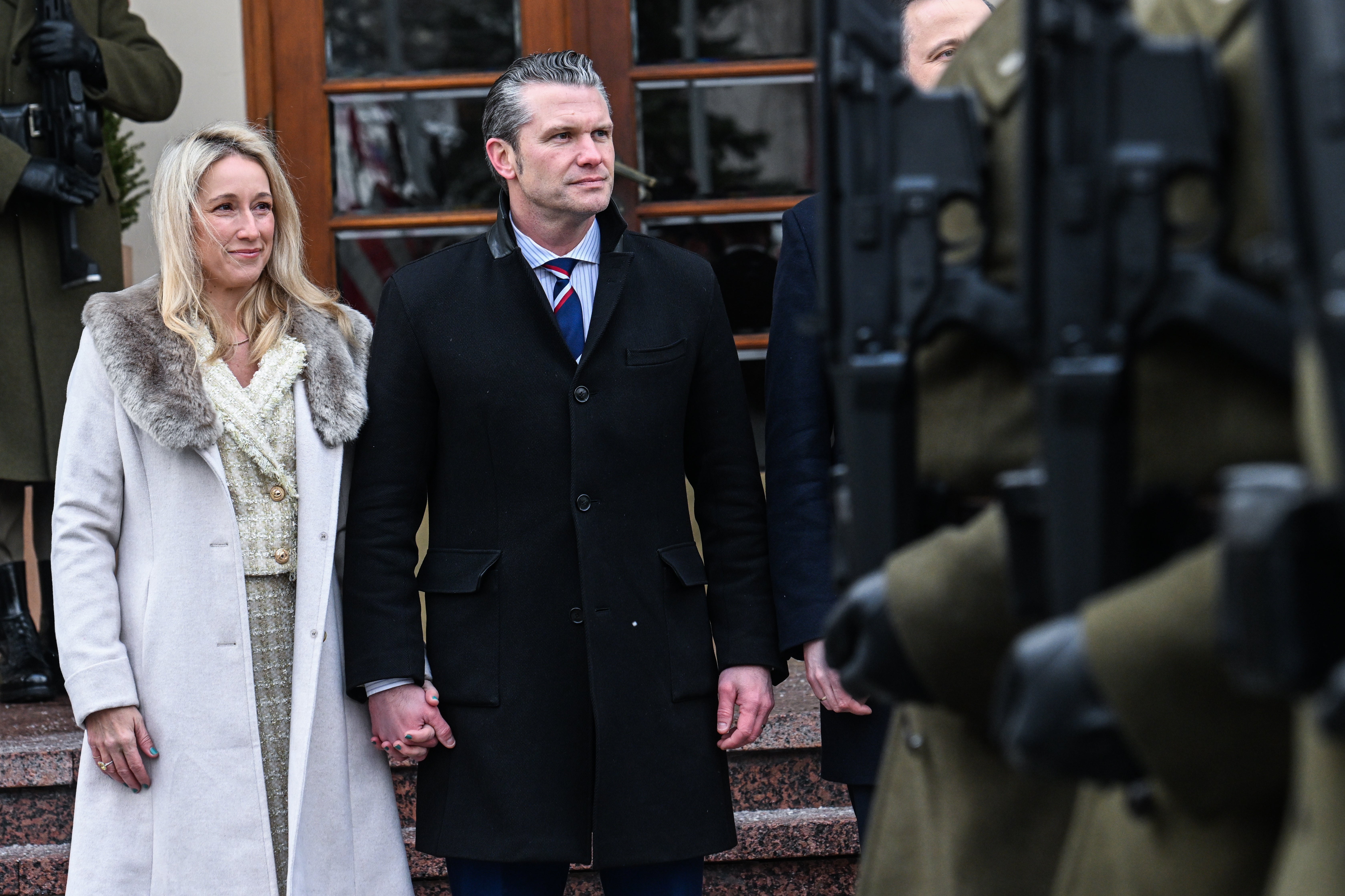 Rauchet and Hegseth at a military parade in Warsaw, Poland, in February
