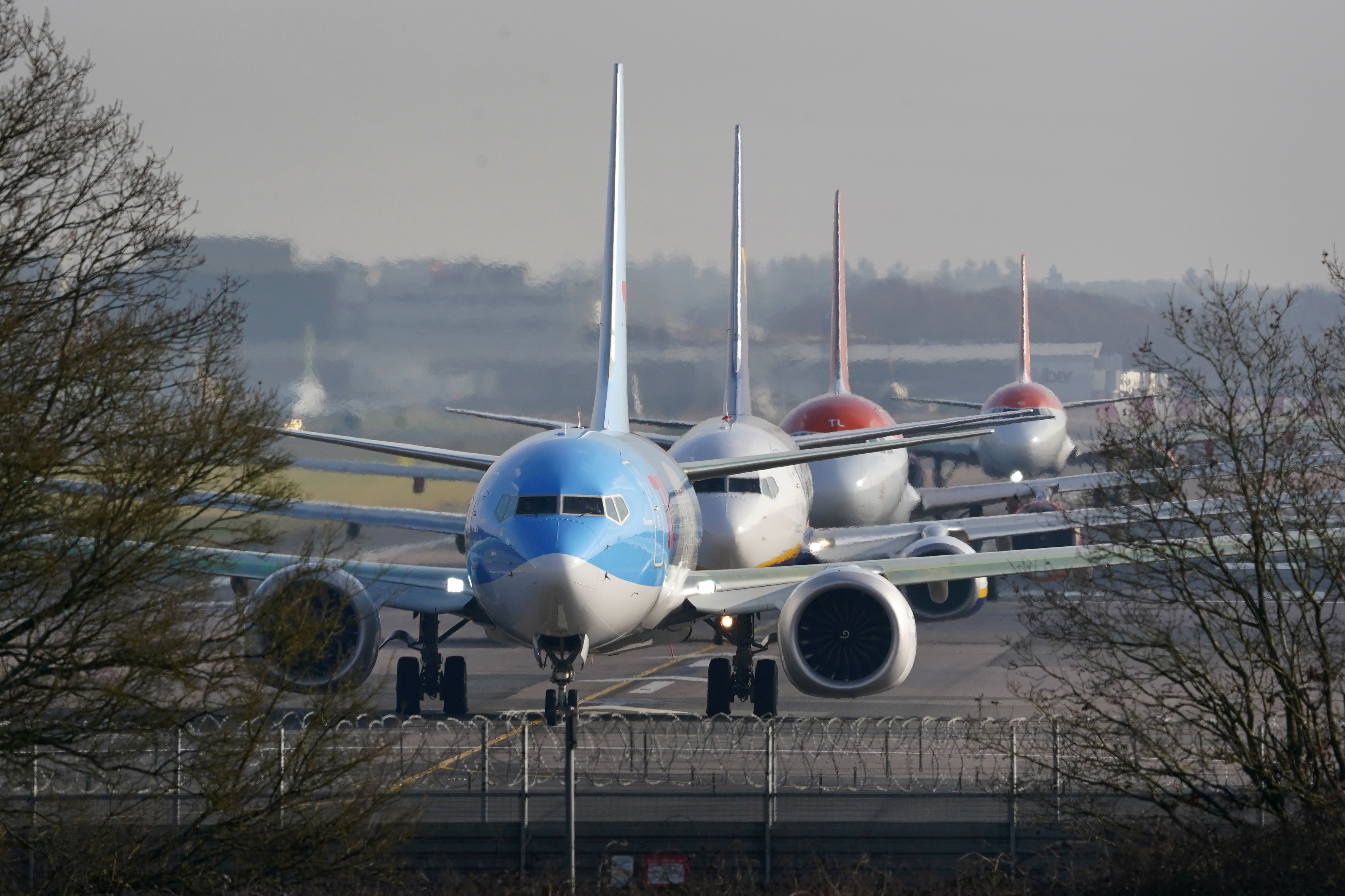 Planes queue for take off at London Gatwick airport in Crawley, West Sussex