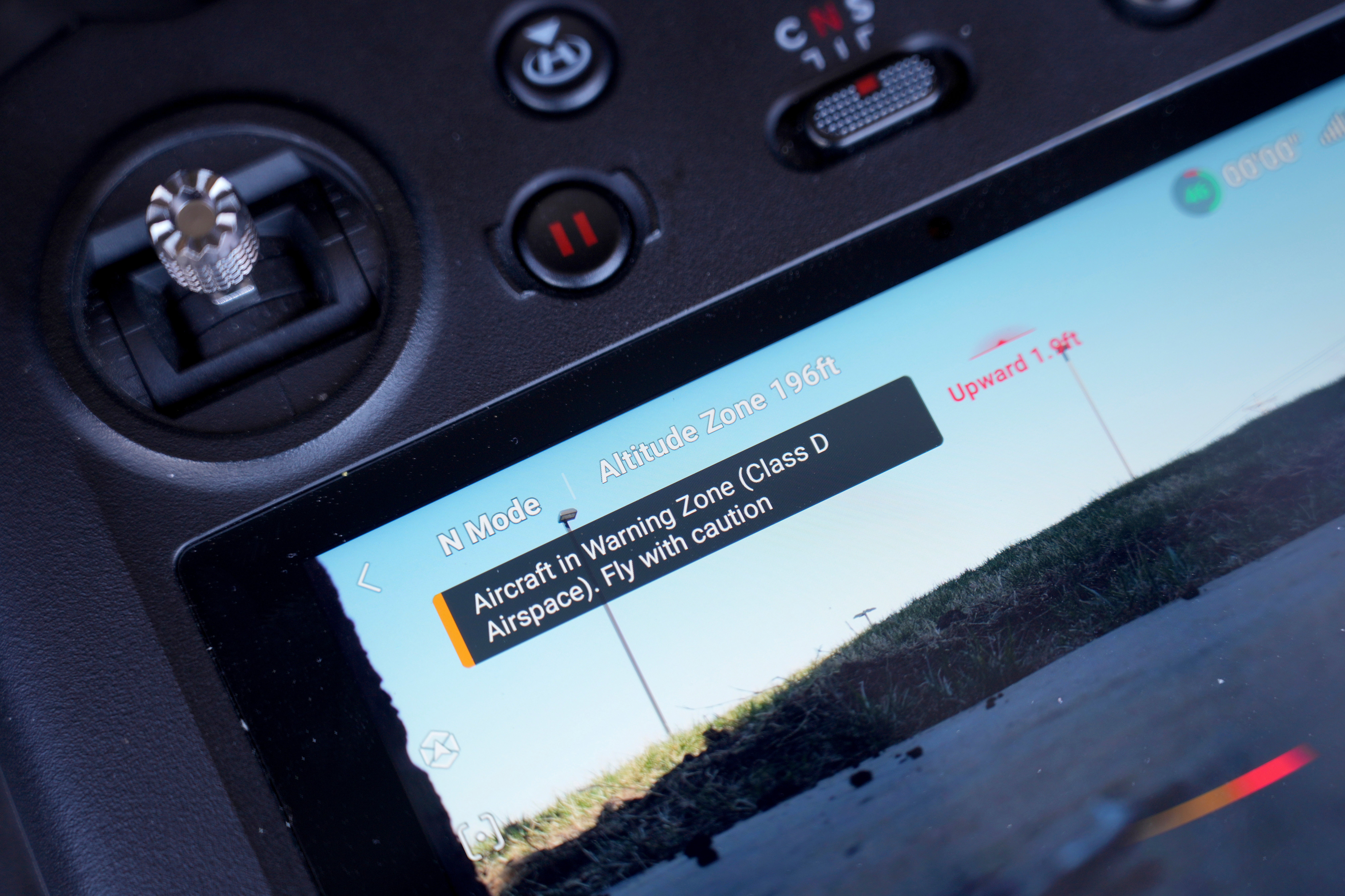 A drone controller warns it is inside the perimeter of an airport's restricted airspace in St. Louis, on Tuesday, March 11, 2025. (AP Photo/Jeff Roberson)