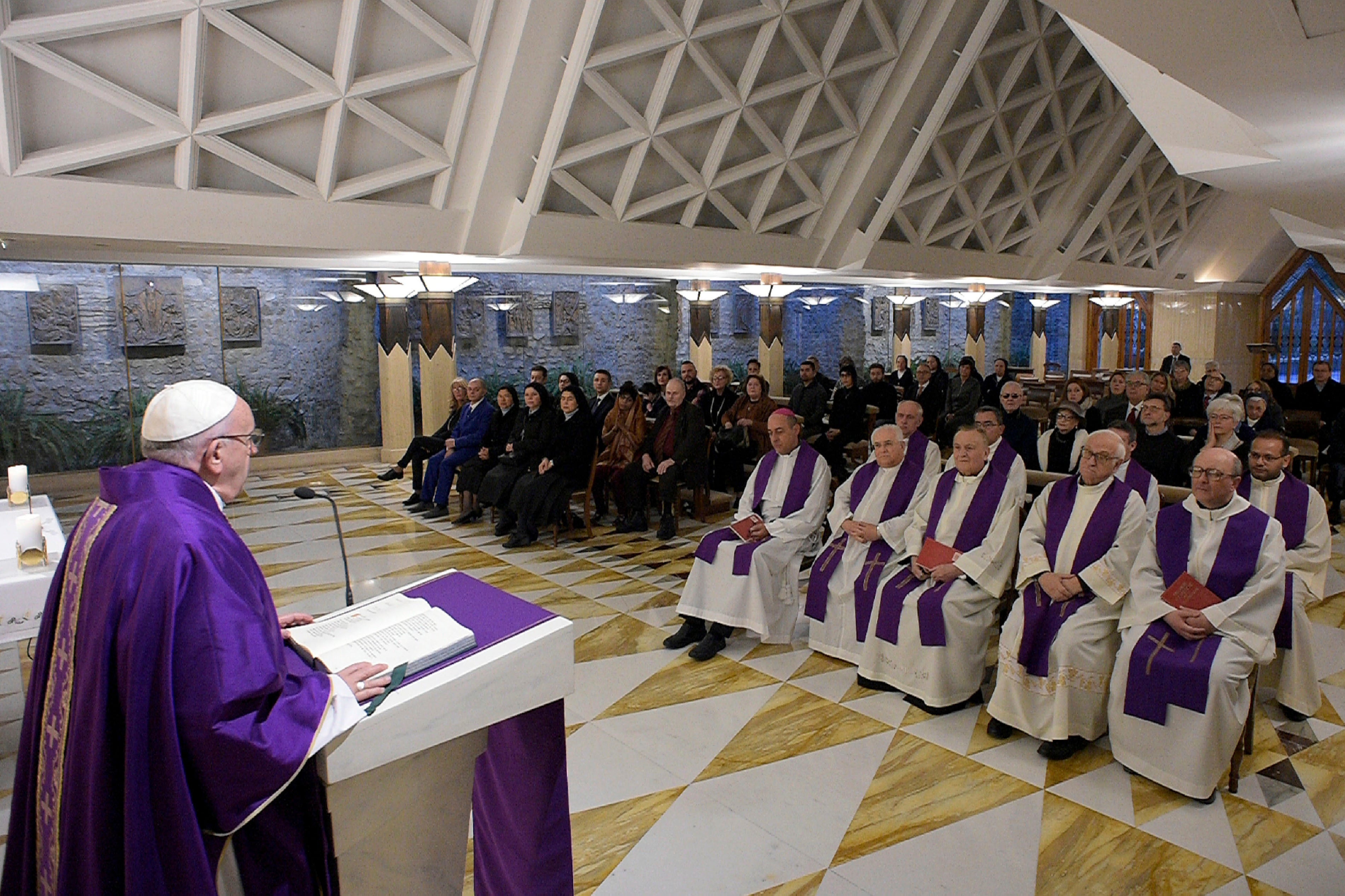 Pope Francis celebrates Mass at the Santa Marta chapel at the Vatican, Friday, Feb. 16, 2018
