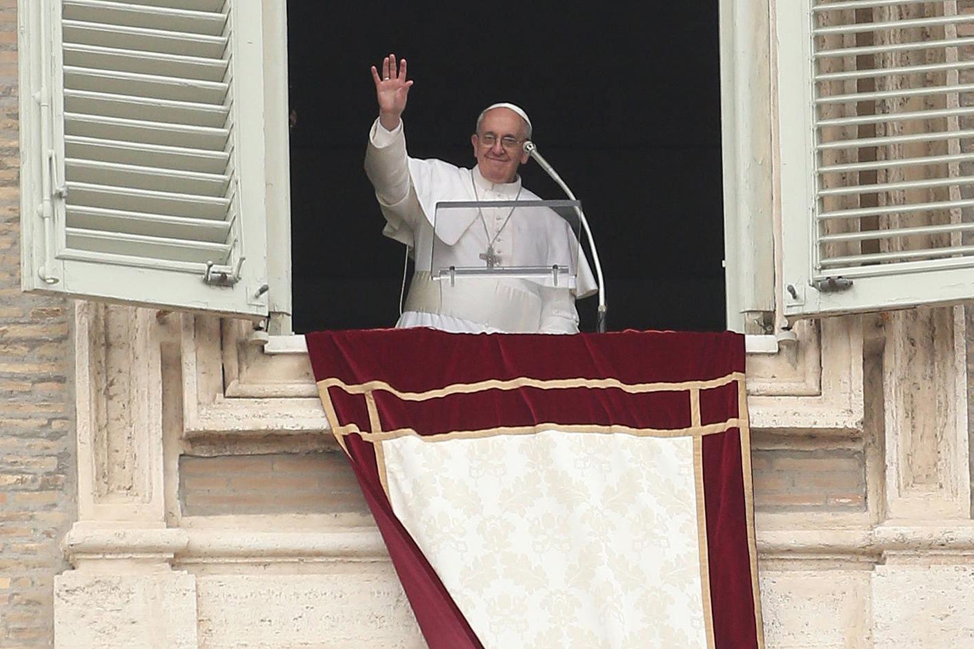 Pope Francis delivering his Angelus prayer from the window of his studio overlooking St Peter’s Square, at the Vatican (Niall Carson/PA)