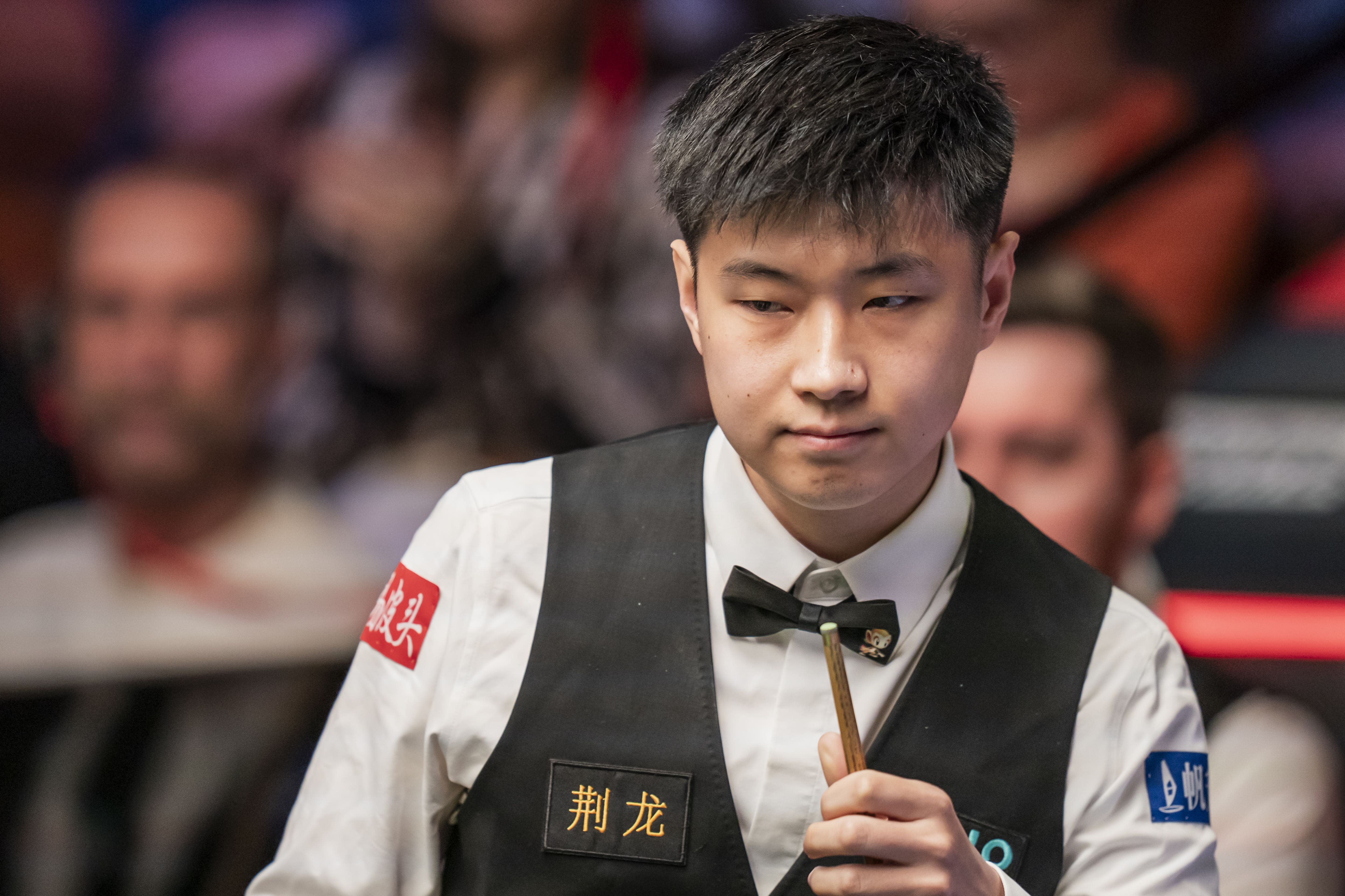 Zhao Xintong cruised into the last 16 of the World Snooker Championship (Danny Lawson/PA)