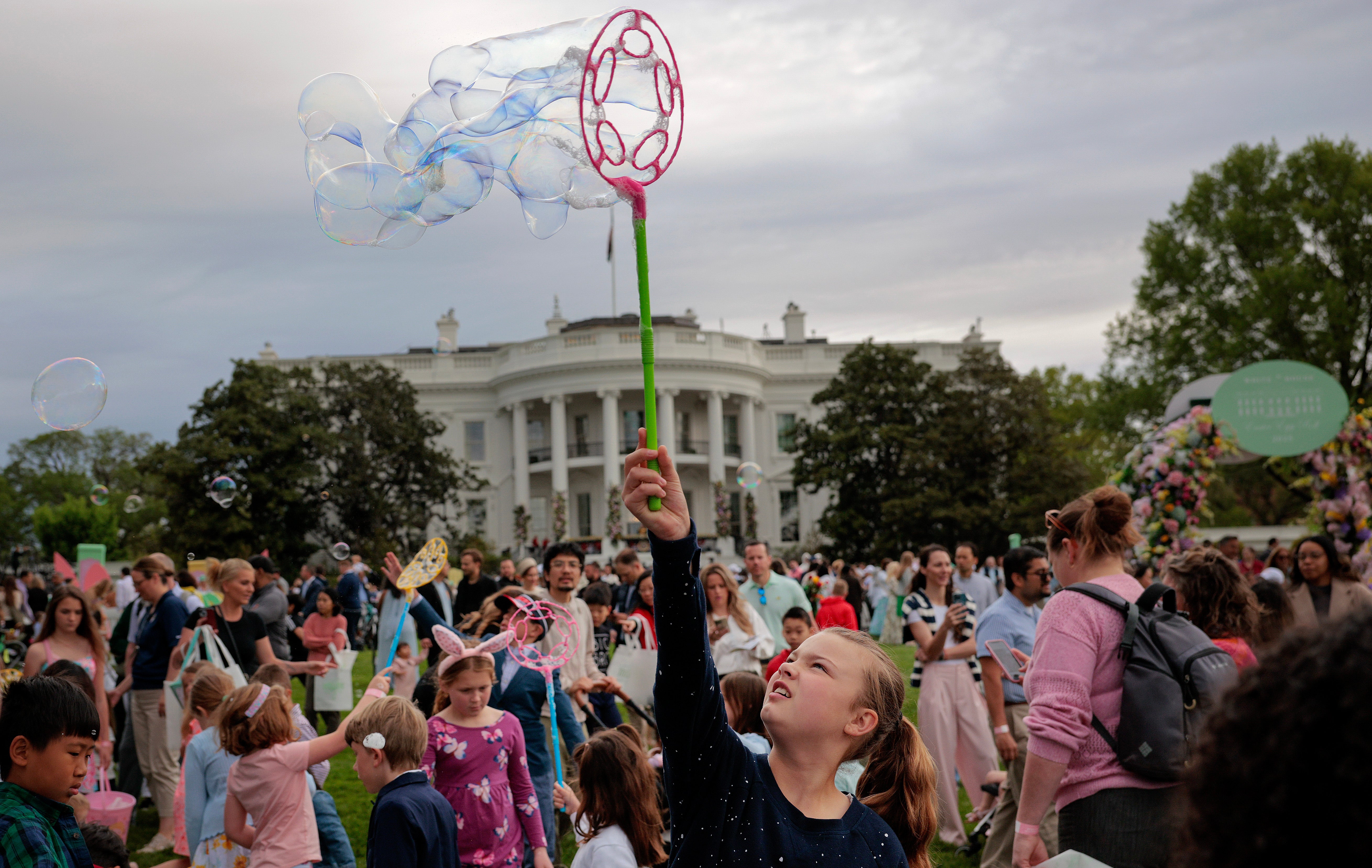 Children played with soap bubbles on the South Lawn during the event, which was initially held on the grounds of the U.S. Capitol in the 1870s