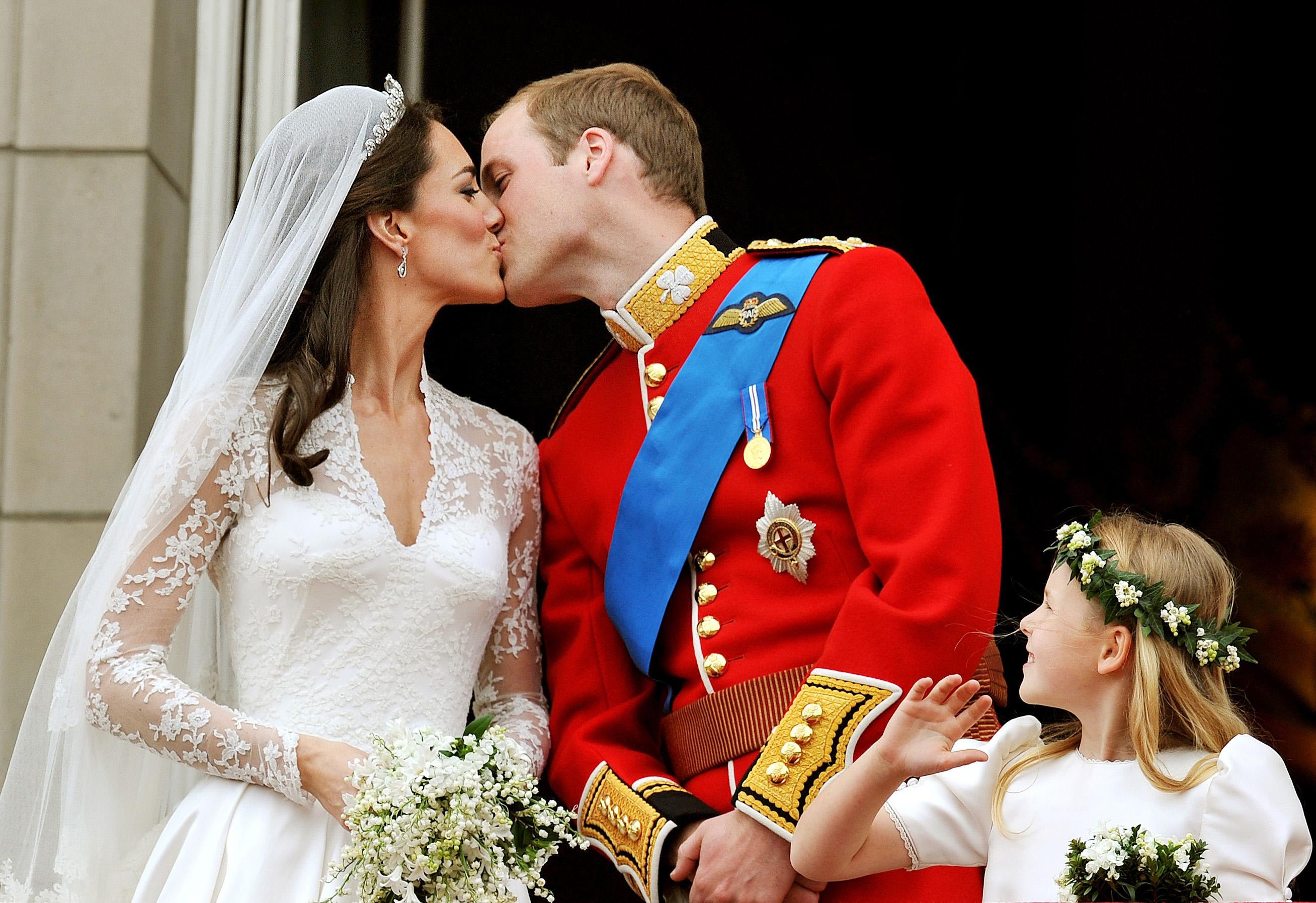 Prince William and his wife Kate Middleton, (the Prince and Princess of Wales) on the balcony of Buckingham Palace, London, following their wedding at Westminster Abbey