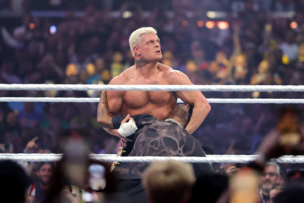Rapper Travis Scott faces off against Cody Rhodes during the WWE Championship match against John Cena during WrestleMania 41