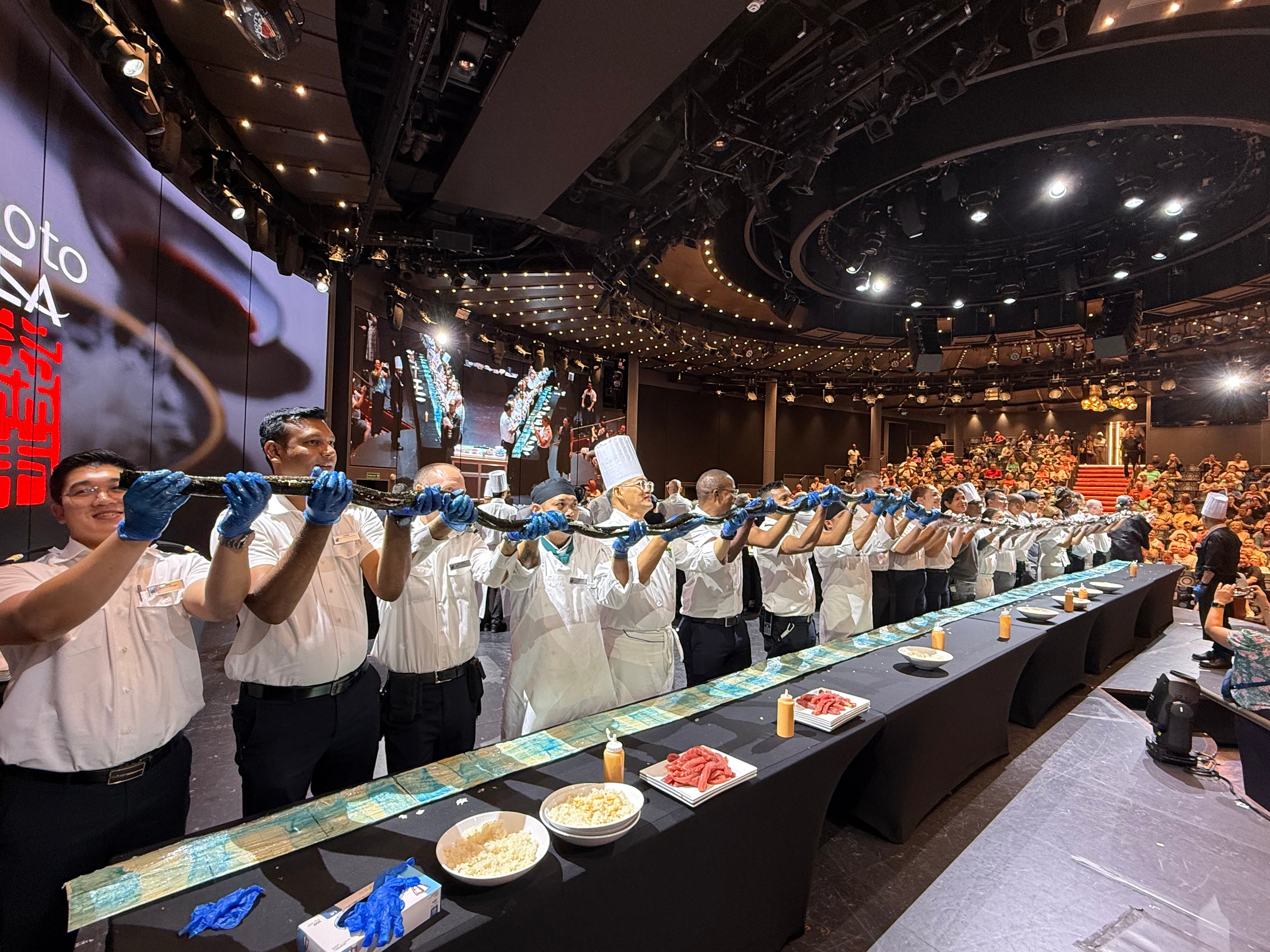 Holland America Line chefs show off the largest sushi roll at sea