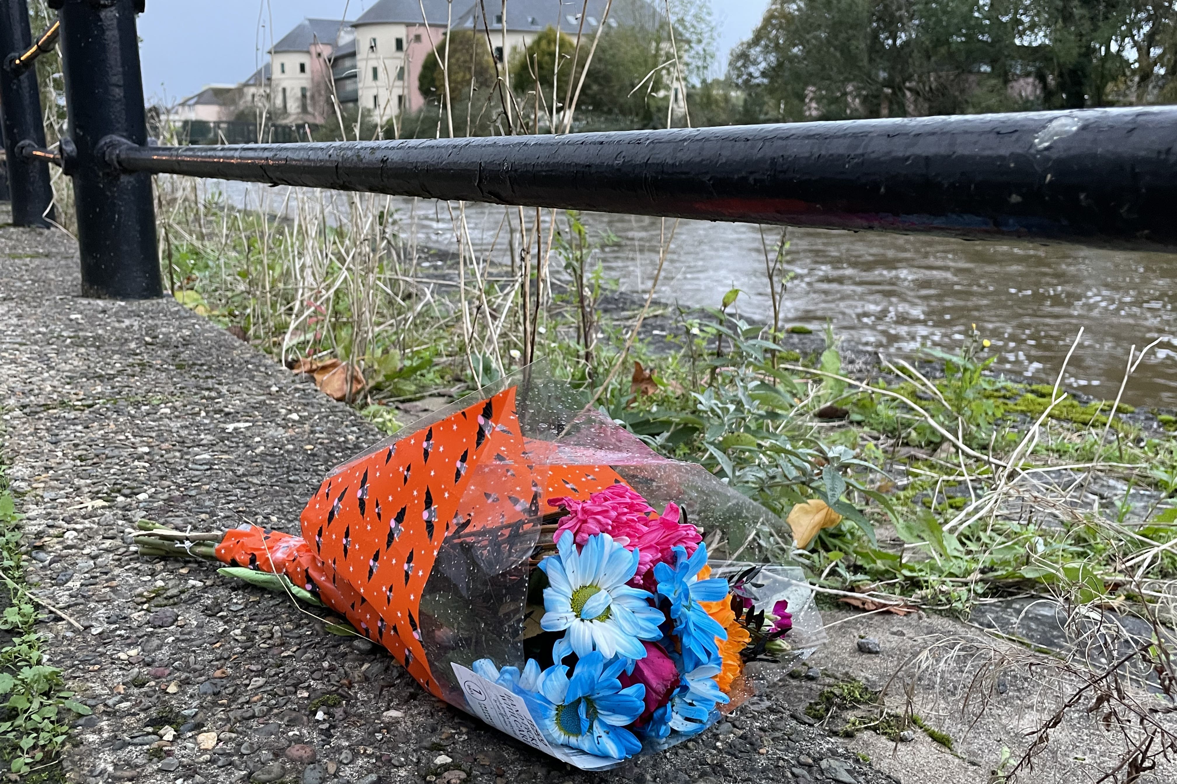 Flowers left by the River Cleddau in Haverfordwest (Bronwen Weatherby/PA)