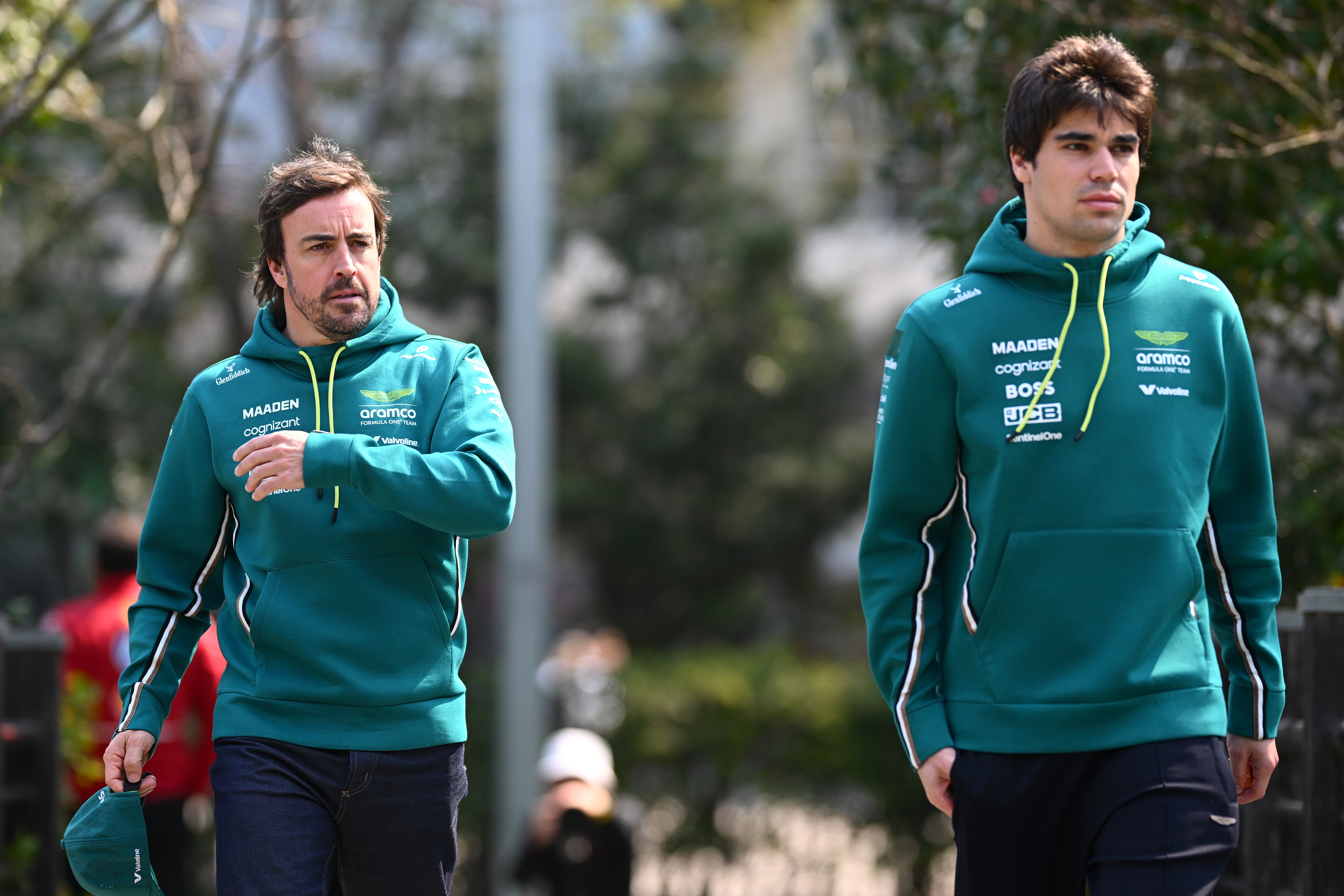 Lance Stroll (right) has scored Aston's only points of the season so far