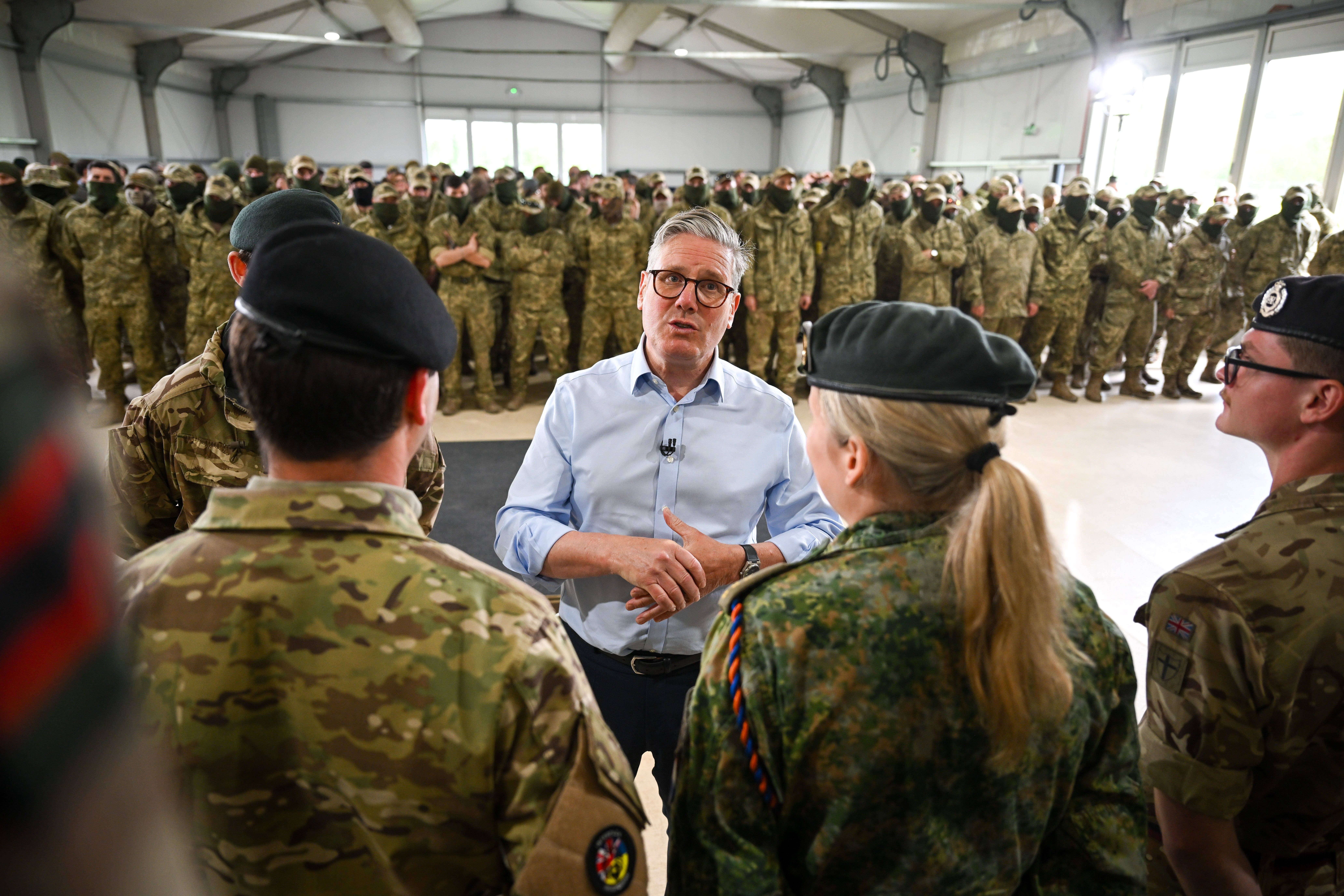 Prime Minister Sir Keir Starmer speaks to troops during a visit to a military base training Ukrainian troops in the west of England (Finnbarr Webster/PA)