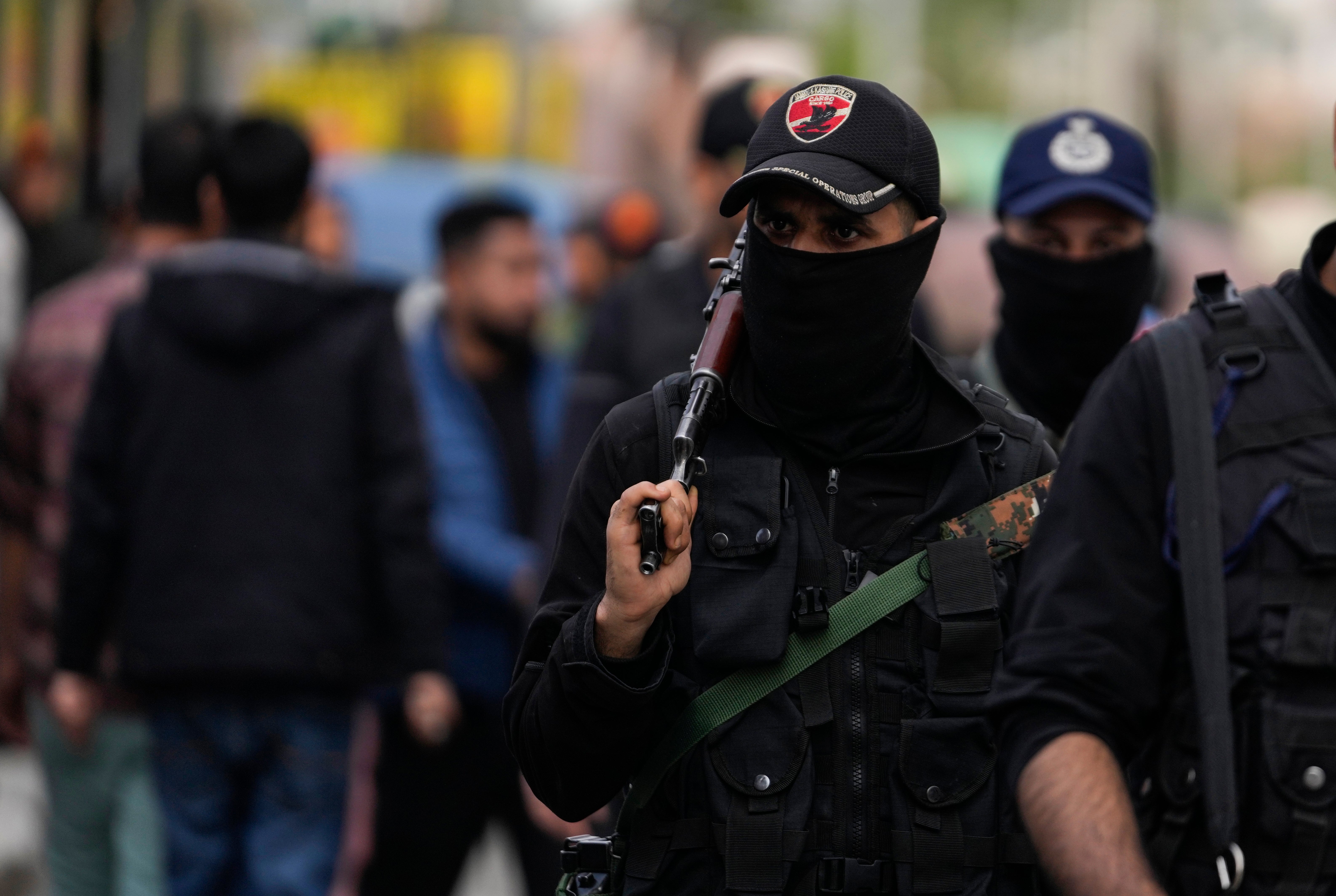 Jammu and Kashmir Special Operation Group (SOG) personnel patrol at a busy market in Srinagar, Indian controlled Kashmir,Tuesday, 22 April 2025