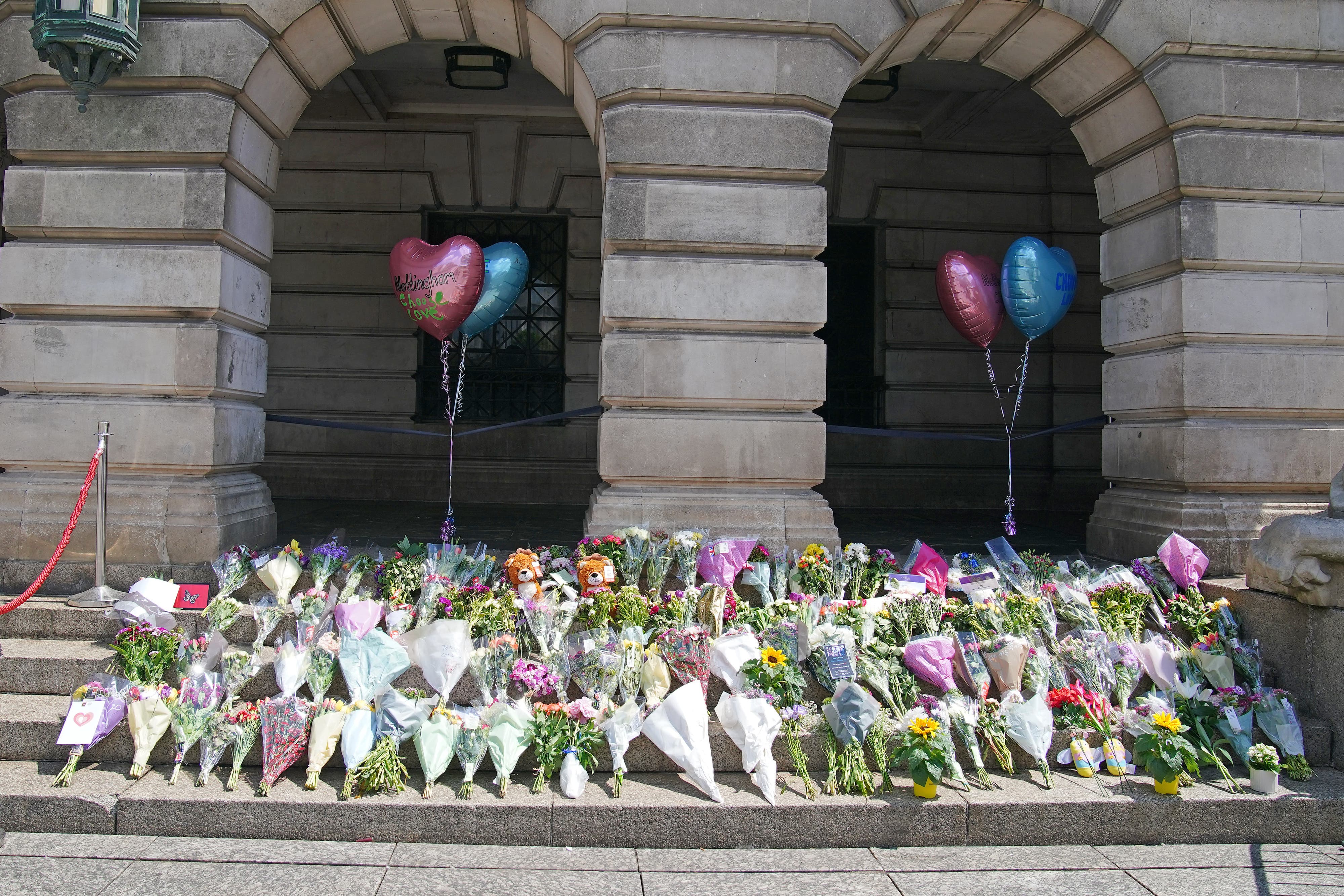 Flowers on the steps of Nottingham Council following the attacks (Peter Byrne/PA)