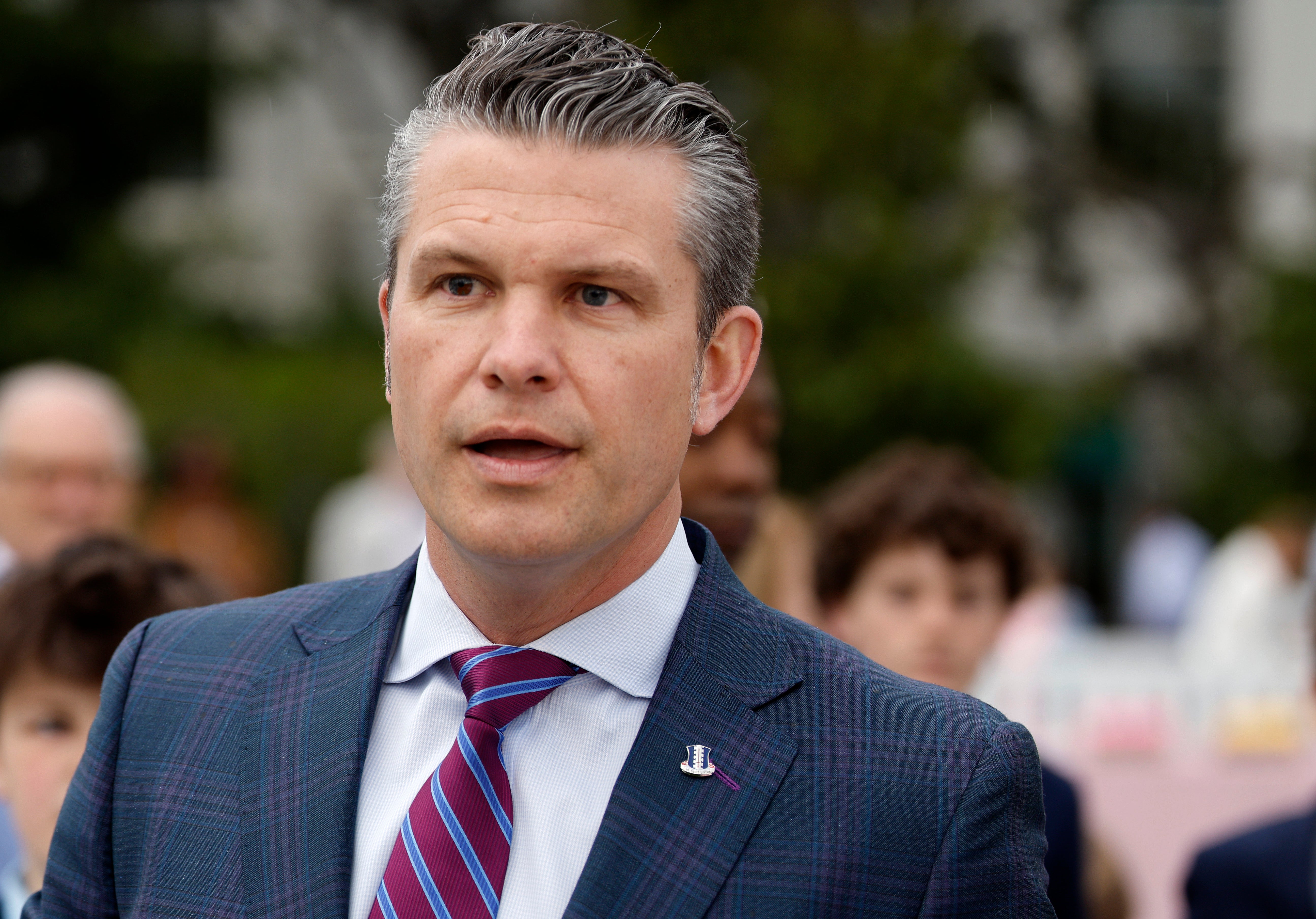 U.S. Secretary of Defense Pete Hegseth speaks to reporters during the White House Easter Egg Roll on the South Lawn on April 21. He has repeatedly rejected allegations that he shared classified information about strikes against the Houthis in Yemen on the messaging app Signal