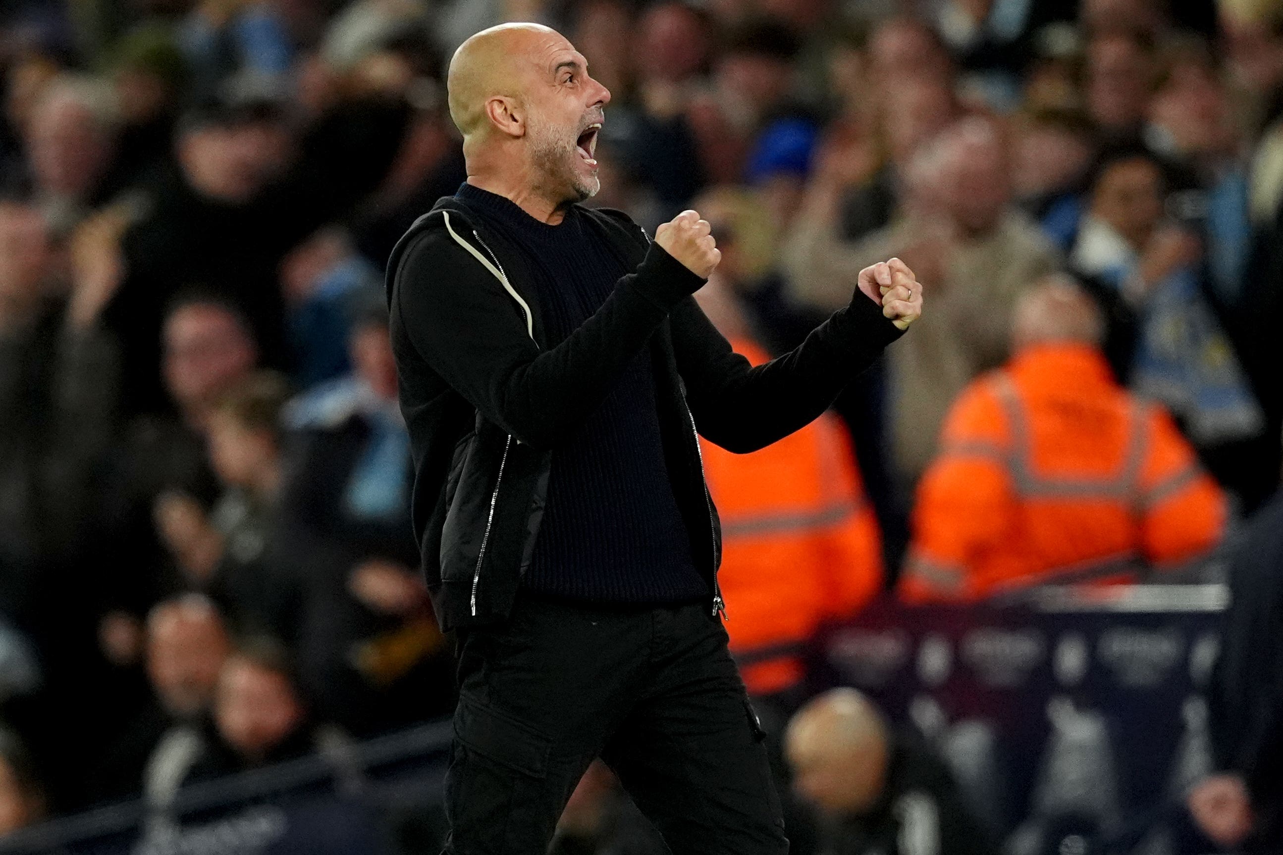 Pep Guardiola celebrates Manchester City’s winning goal (Martin Rickett/PA)