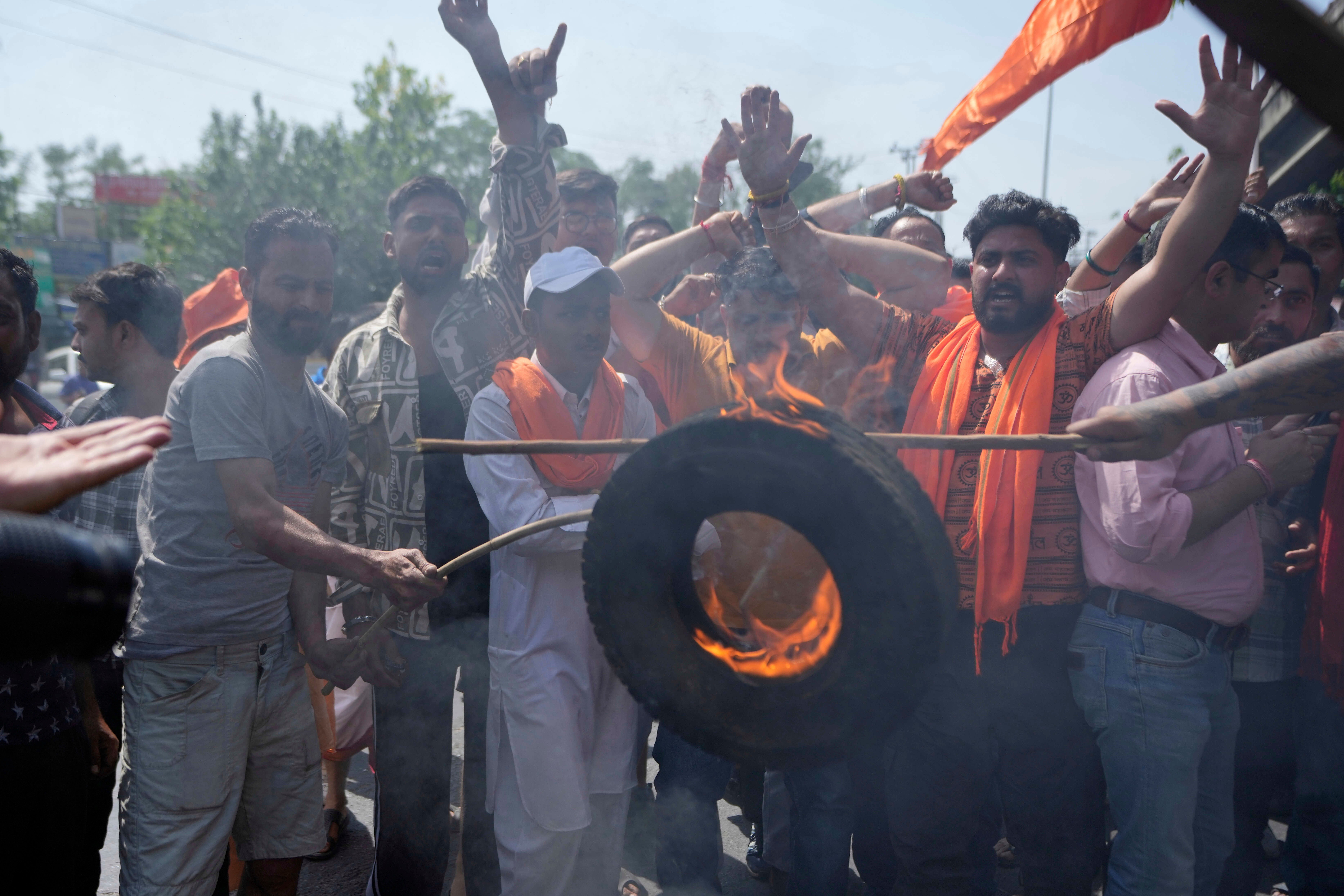 People shout slogans against Pakistan during a protest against the Pahalgam attack in Jammu on 23 April 2025