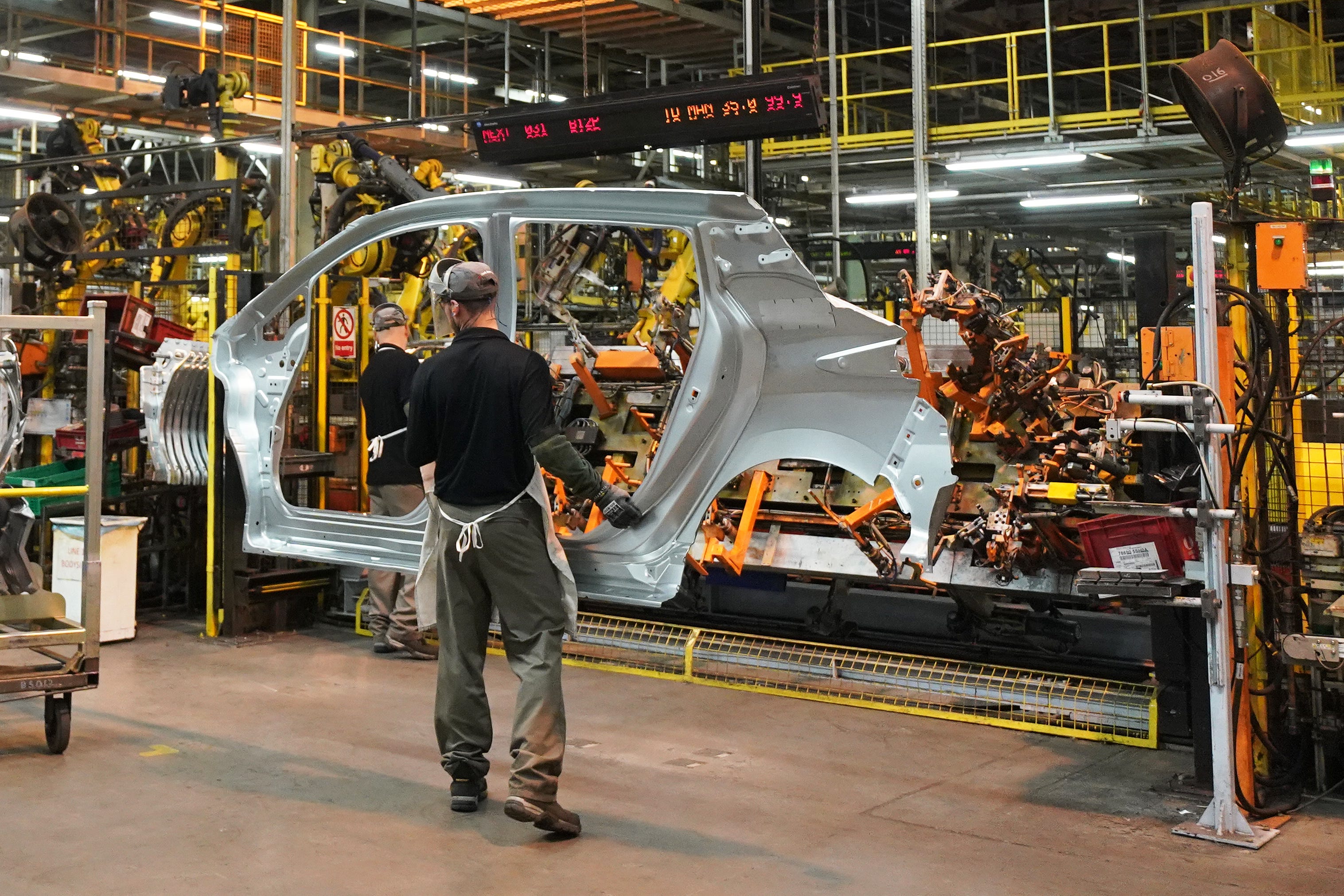 Exporters like car manufacturers have been hit especially hard by the new tariffs (Owen Humphreys/PA)