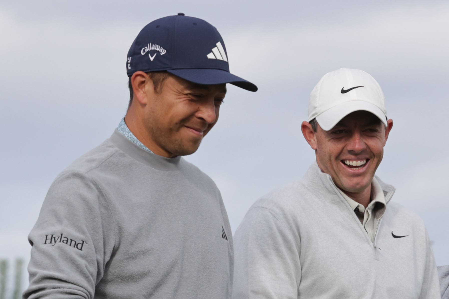 Xander Schauffele (right) feels Rory McIlroy may well now “rattle off” a few more major wins (Steve Welsh/PA)