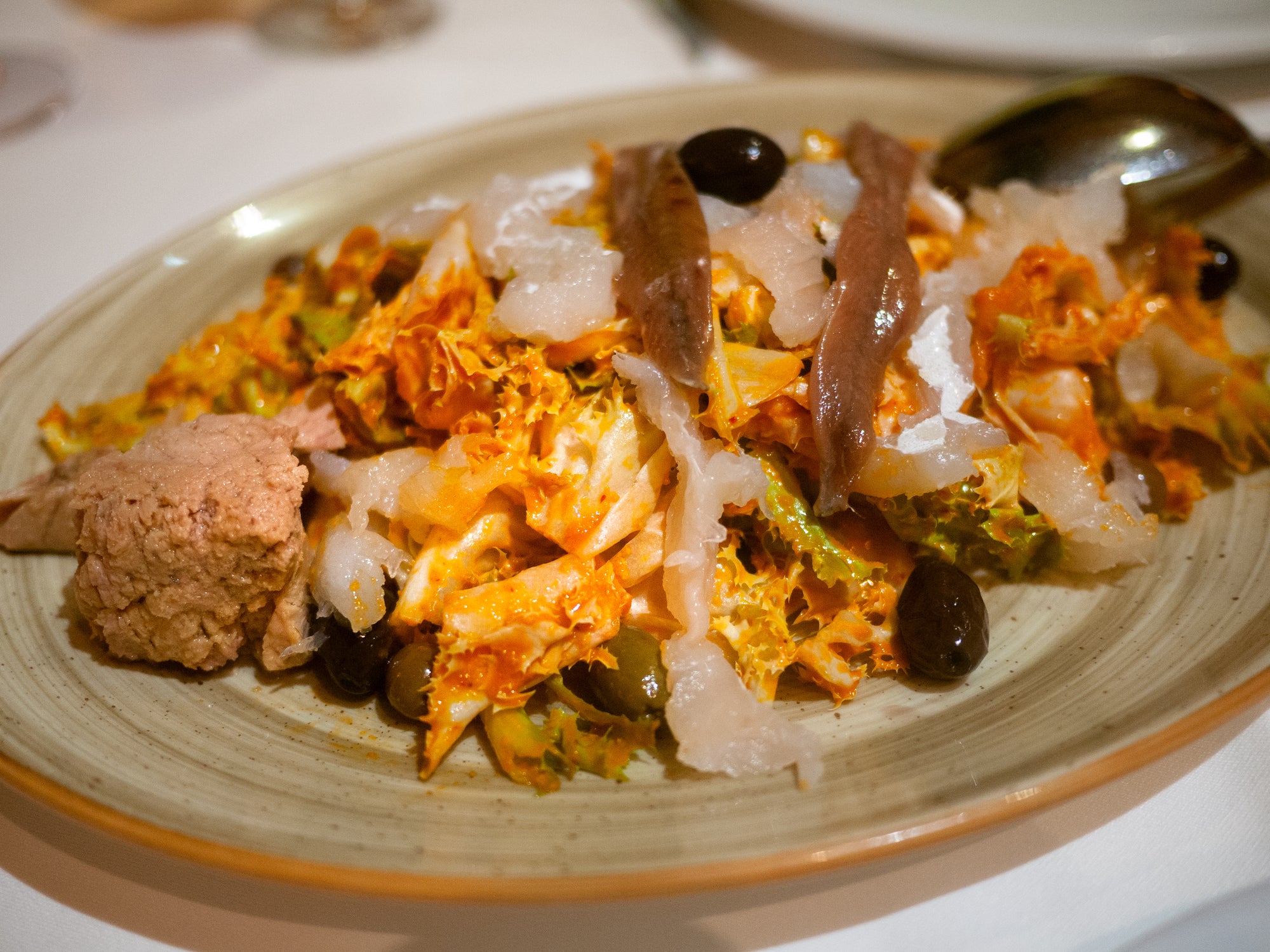 Make sure to sample some delicious traditional dishes, like xató , made with tomato and salt cod or tuna