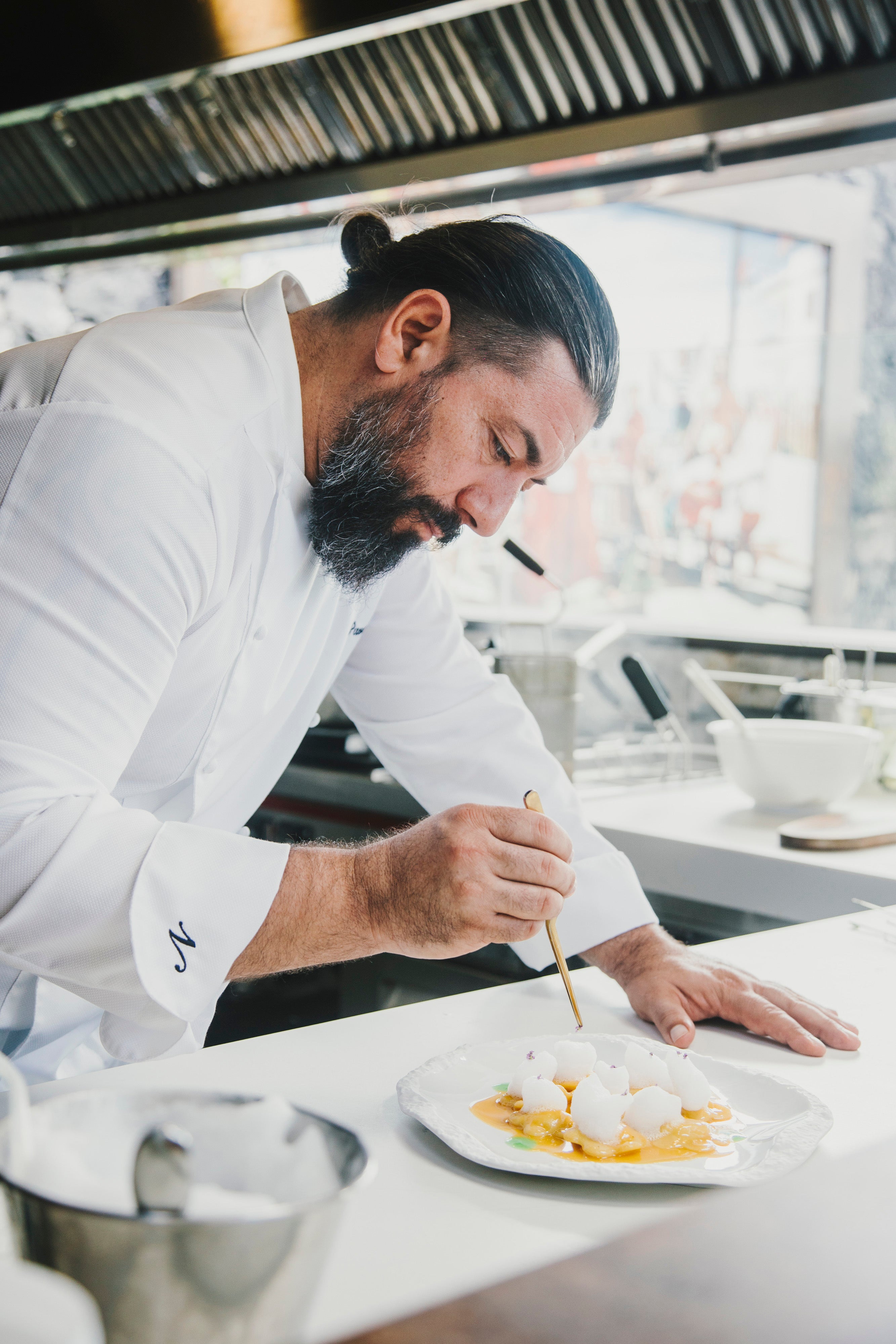 Il Bocconcino chef Niki Pavanelli plates up a dish