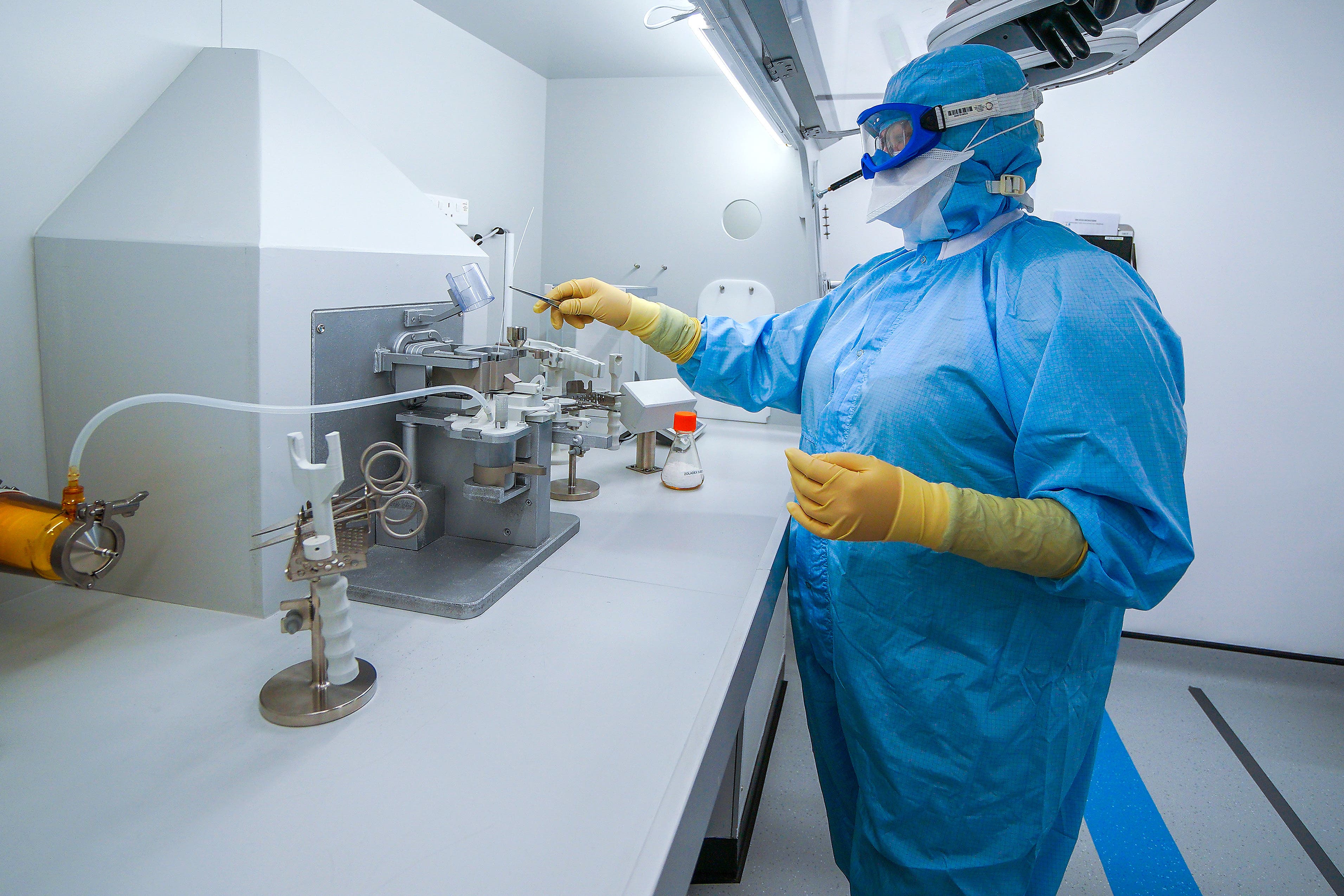 Staff work inside the AstraZeneca Laboratory in Macclesfield (Peter Byrne/PA)