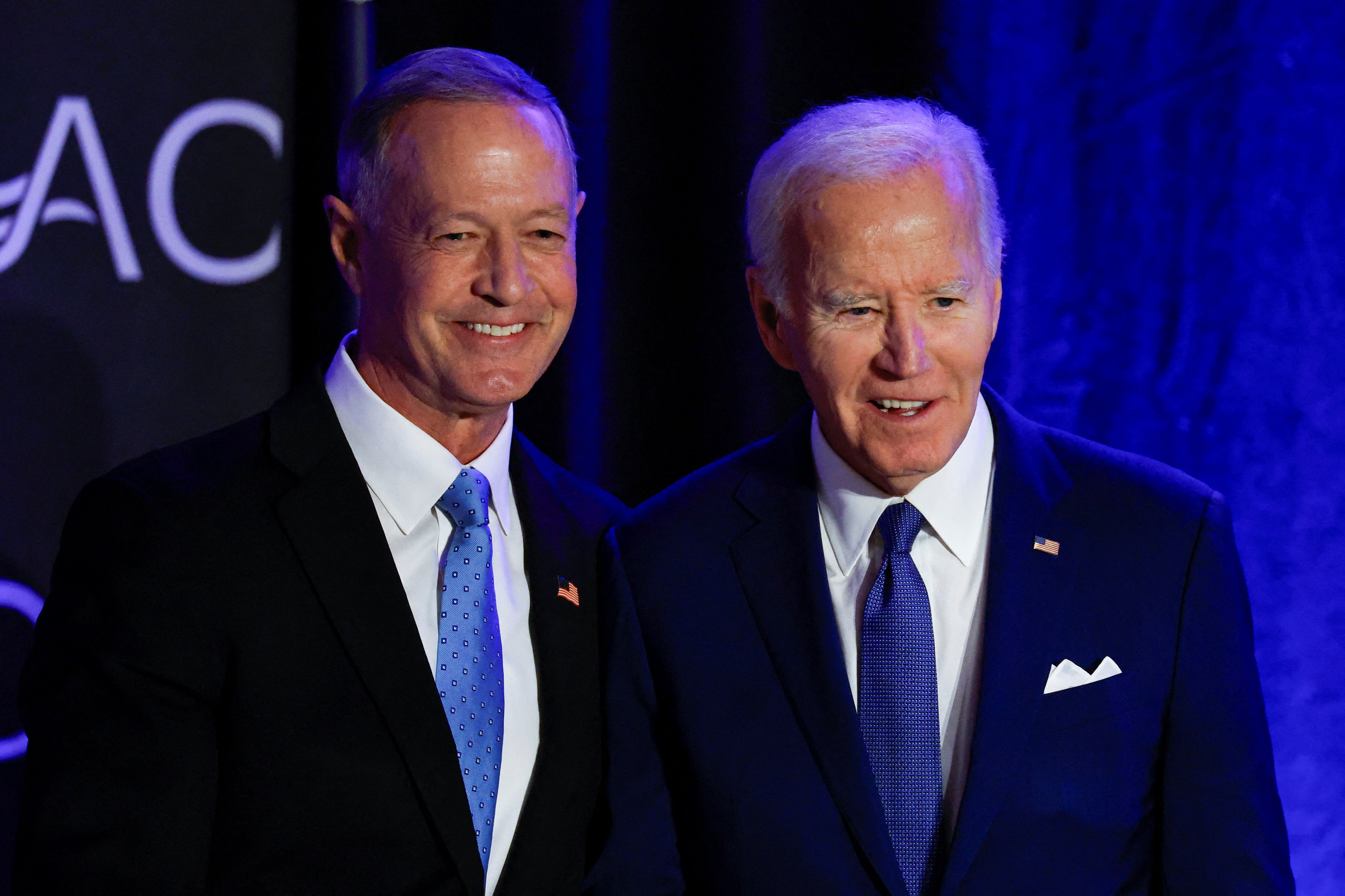 Former President Joe Biden poses with former Social Security Commissioner Martin O'Malley as Biden makes his first major speech since leaving office, at the Advocates, Counselors, and Representatives for the Disabled conference in Chicago