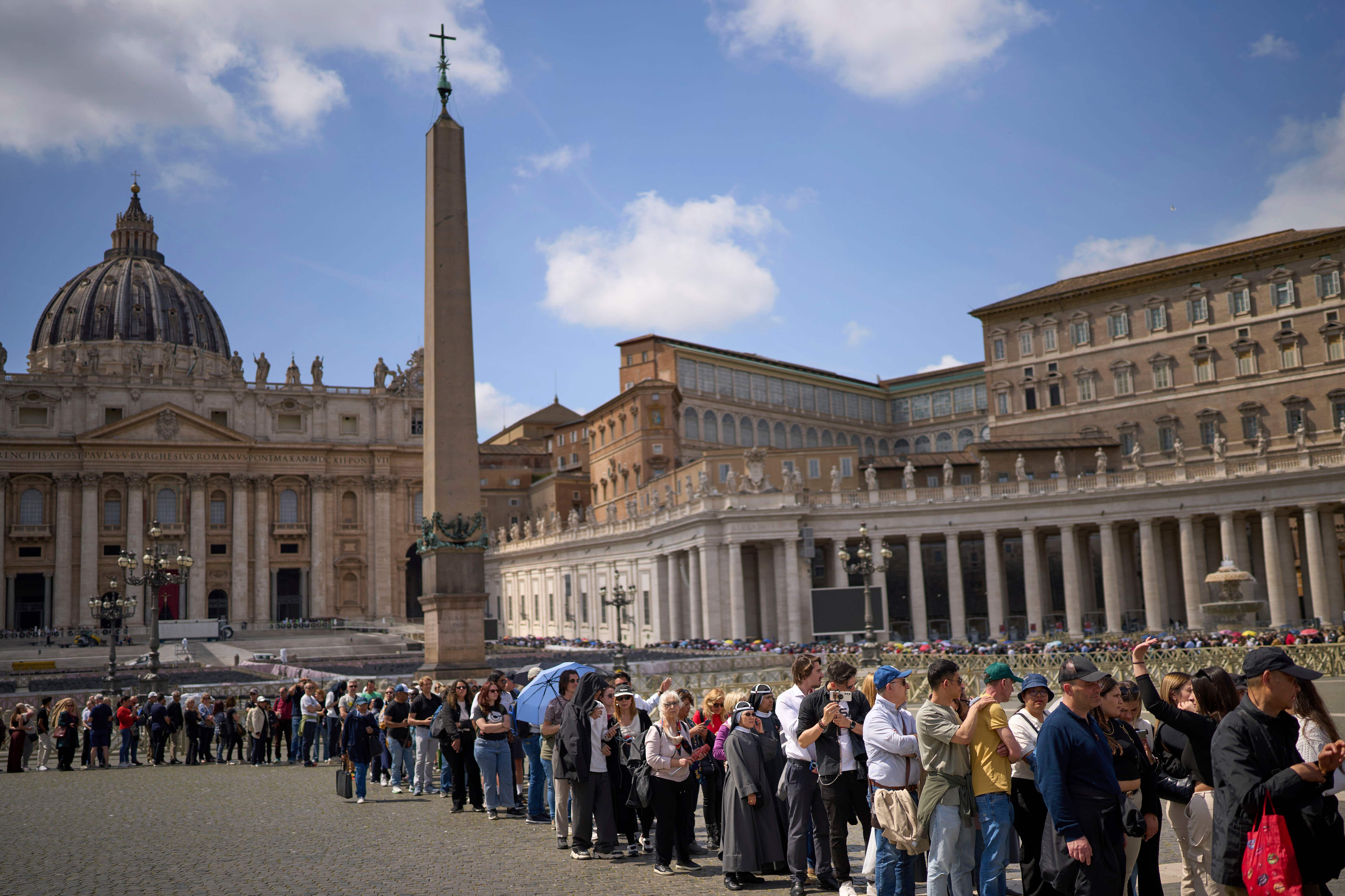 People queue in St. Peter’s Square to pay their respect to the late Pope Francis (Emilio Morenatti/AP)